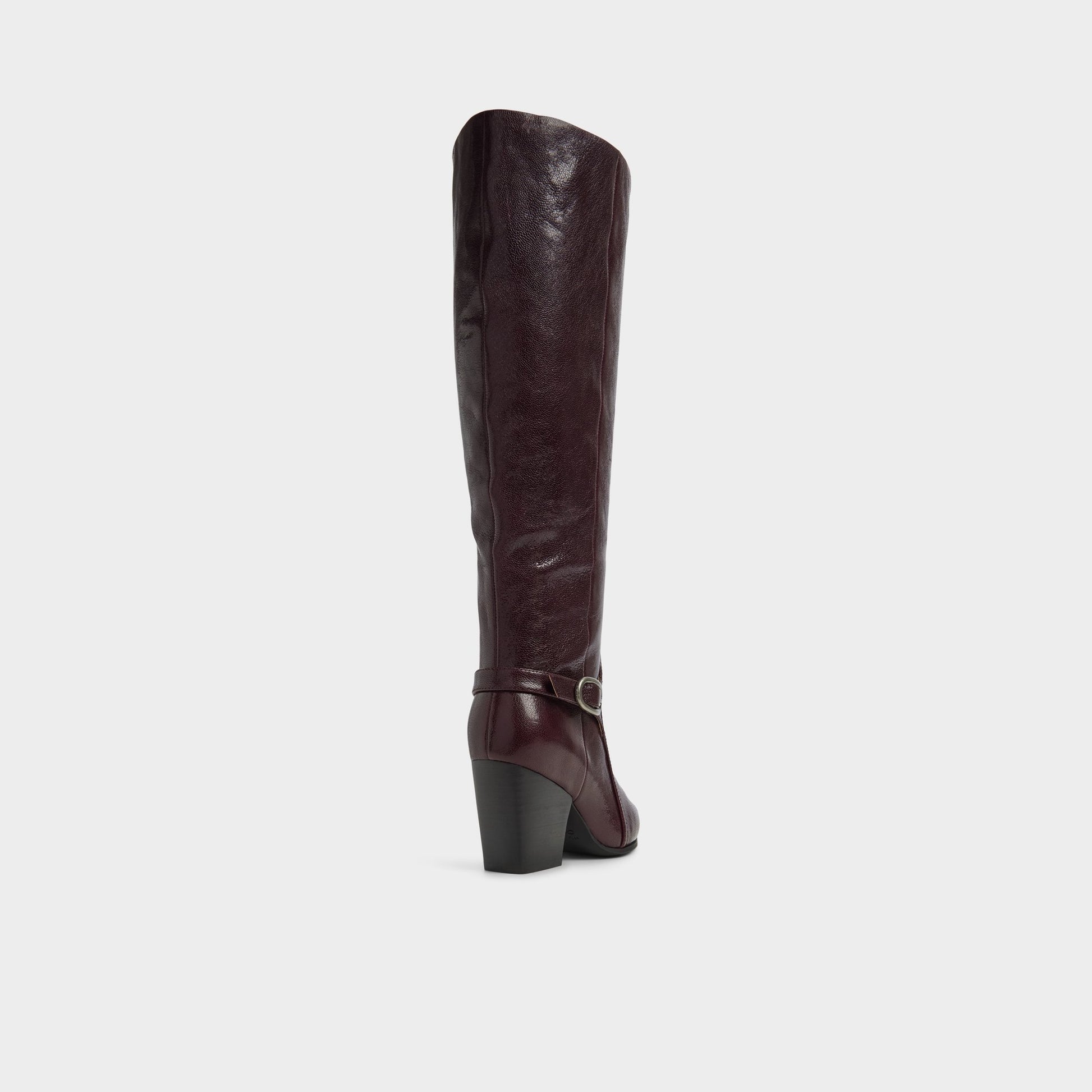 Three-quarter angle of Bordo Saddle Knee-high boot's back side