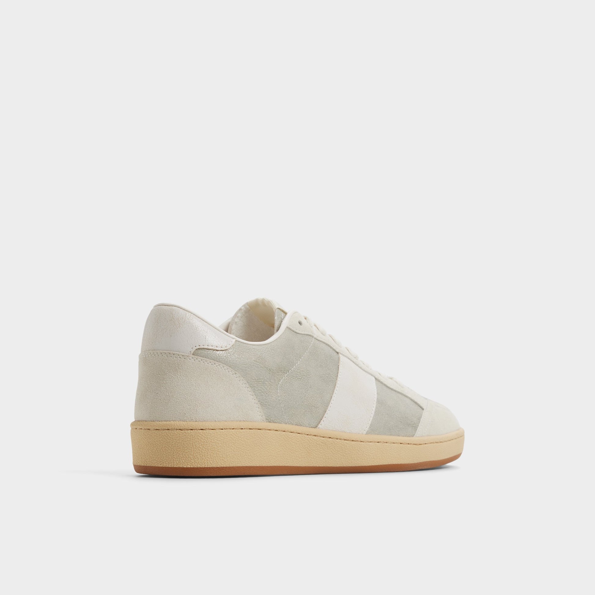 Three-quarter angle of Ivory Roscoe Low top sneaker's back side