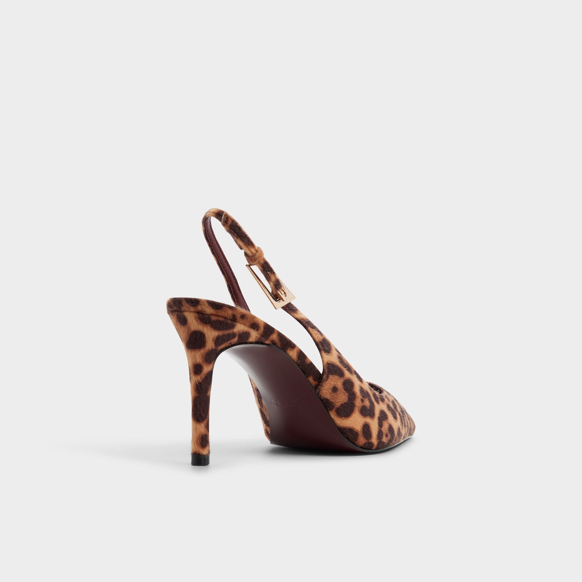 Three-quarter angle of Black/gold multi Syliaa Slingback heel's back side