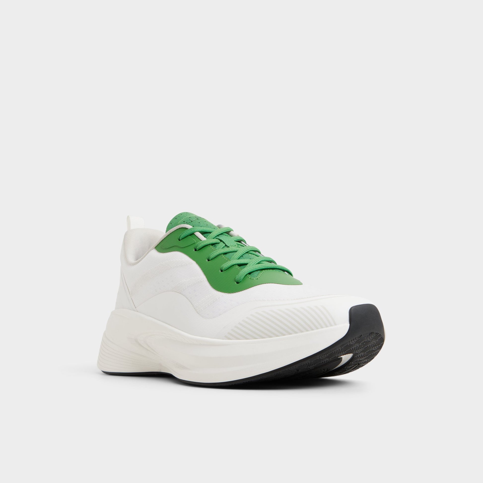 Three-quarter angle of White combo Pillowsnkr-m Jogger sneaker's front side