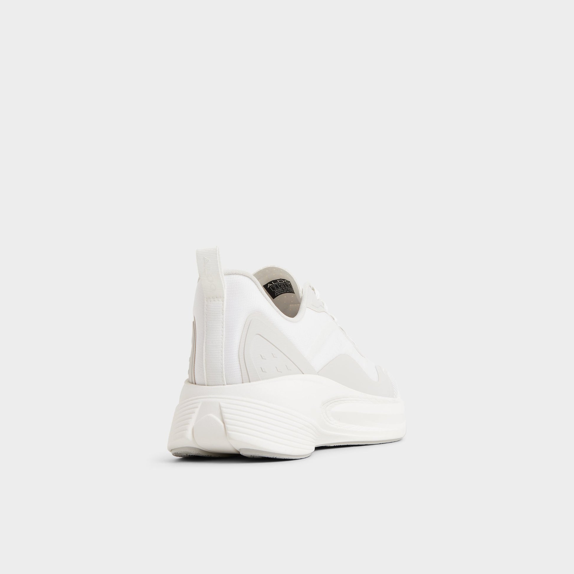 Three-quarter angle of White Pillowsnkr-m Jogger sneaker's back side