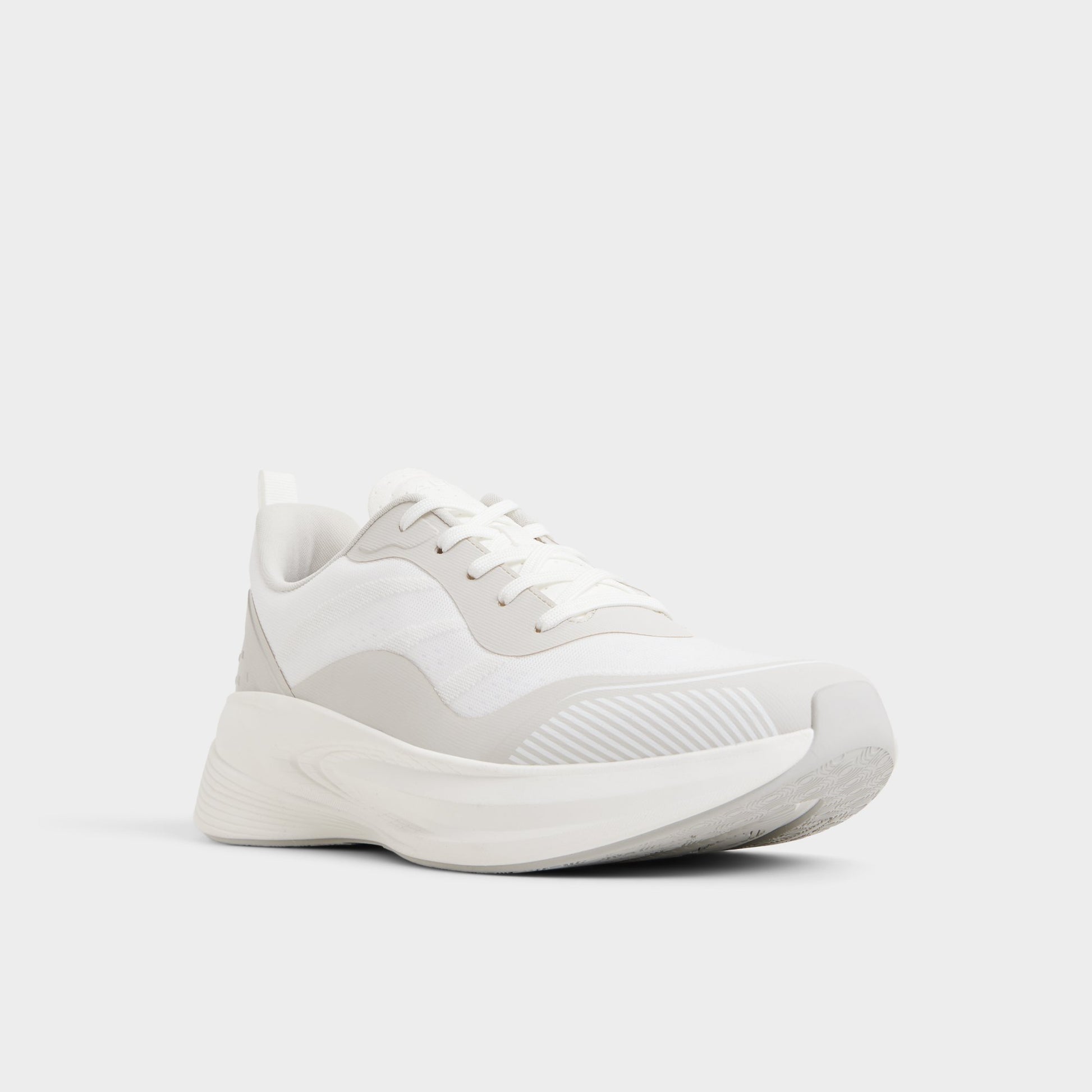 Three-quarter angle of White Pillowsnkr-m Jogger sneaker's front side