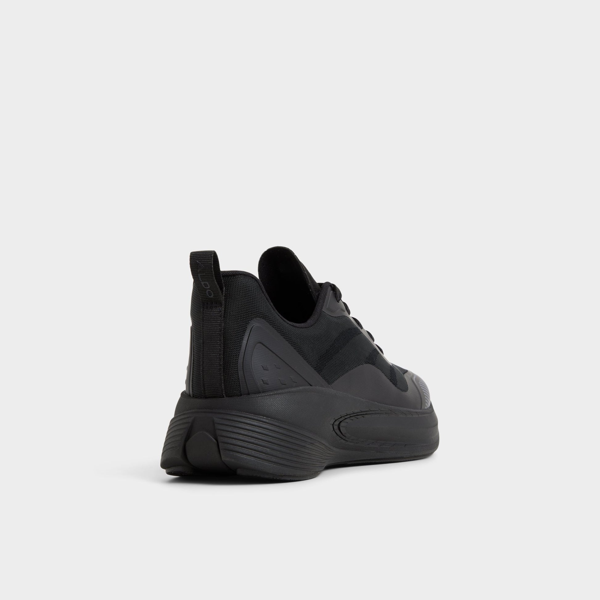Three-quarter angle of Black/black Pillowsnkr-m Jogger sneaker's back side