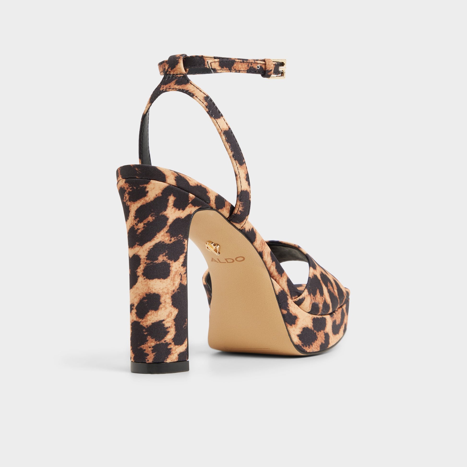 Three-quarter angle of Brown multi Chicgleam Heeled sandal's back side