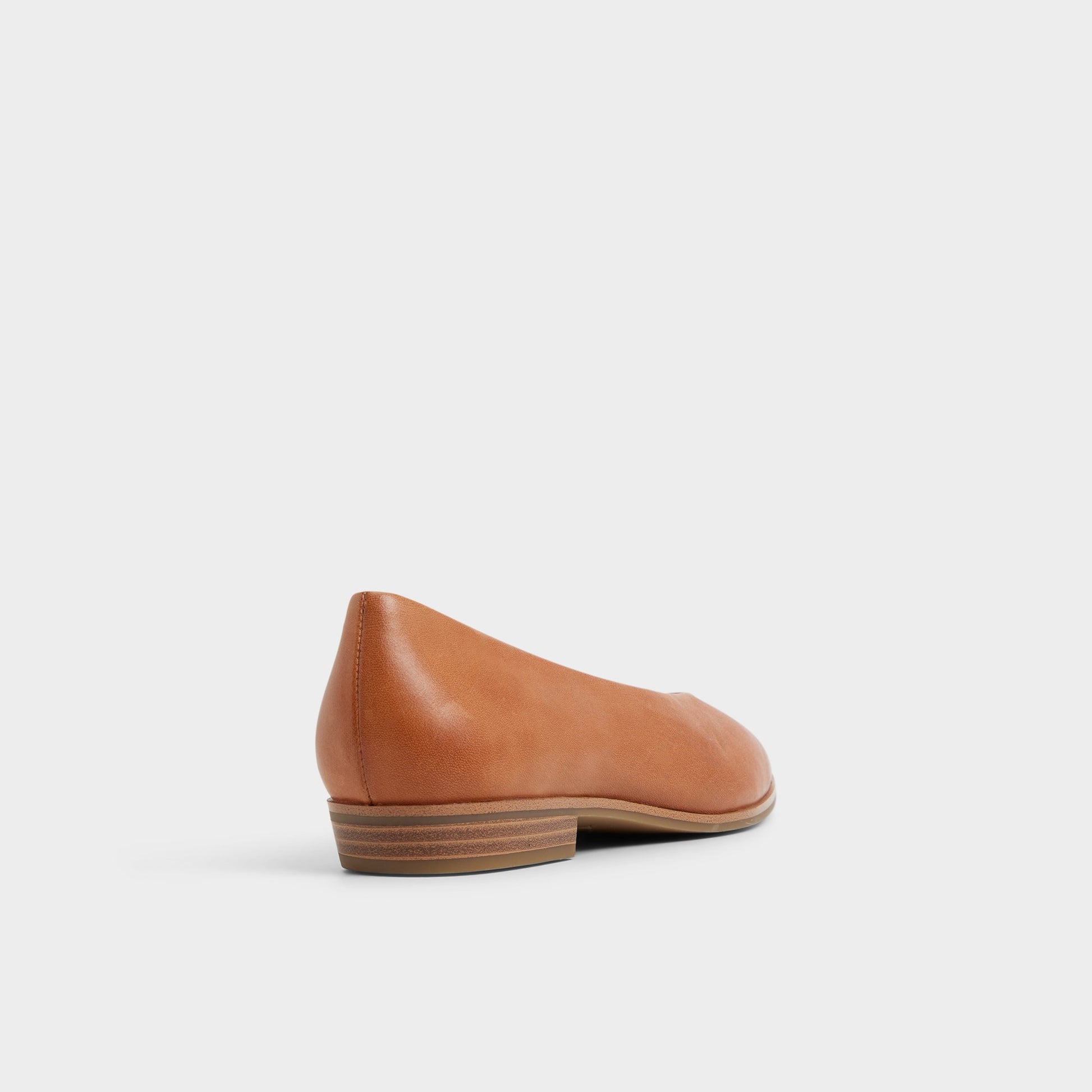 Three-quarter angle of Light Brown Devereteriel Slip-on's back side