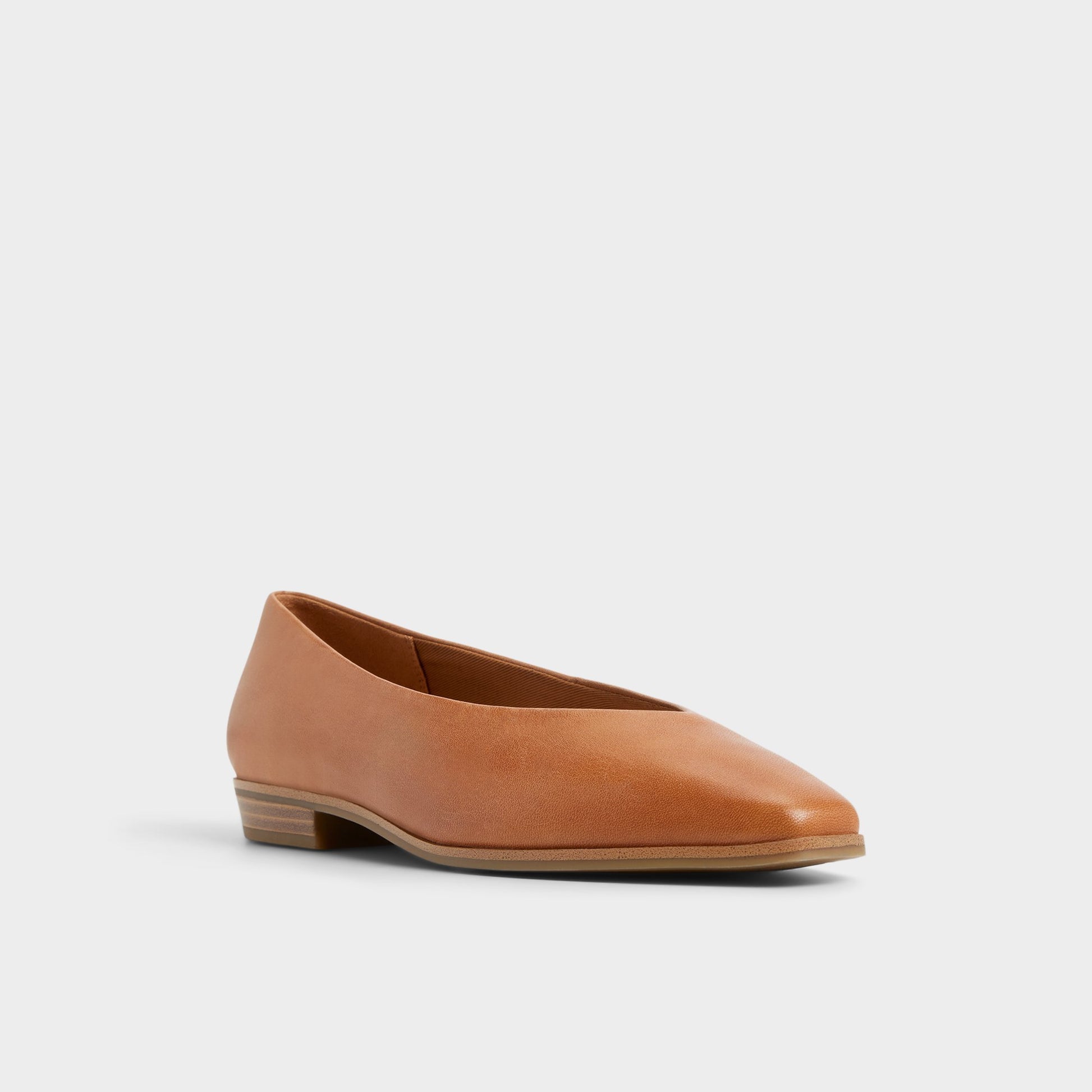 Three-quarter angle of Light Brown Devereteriel Slip-on's front side