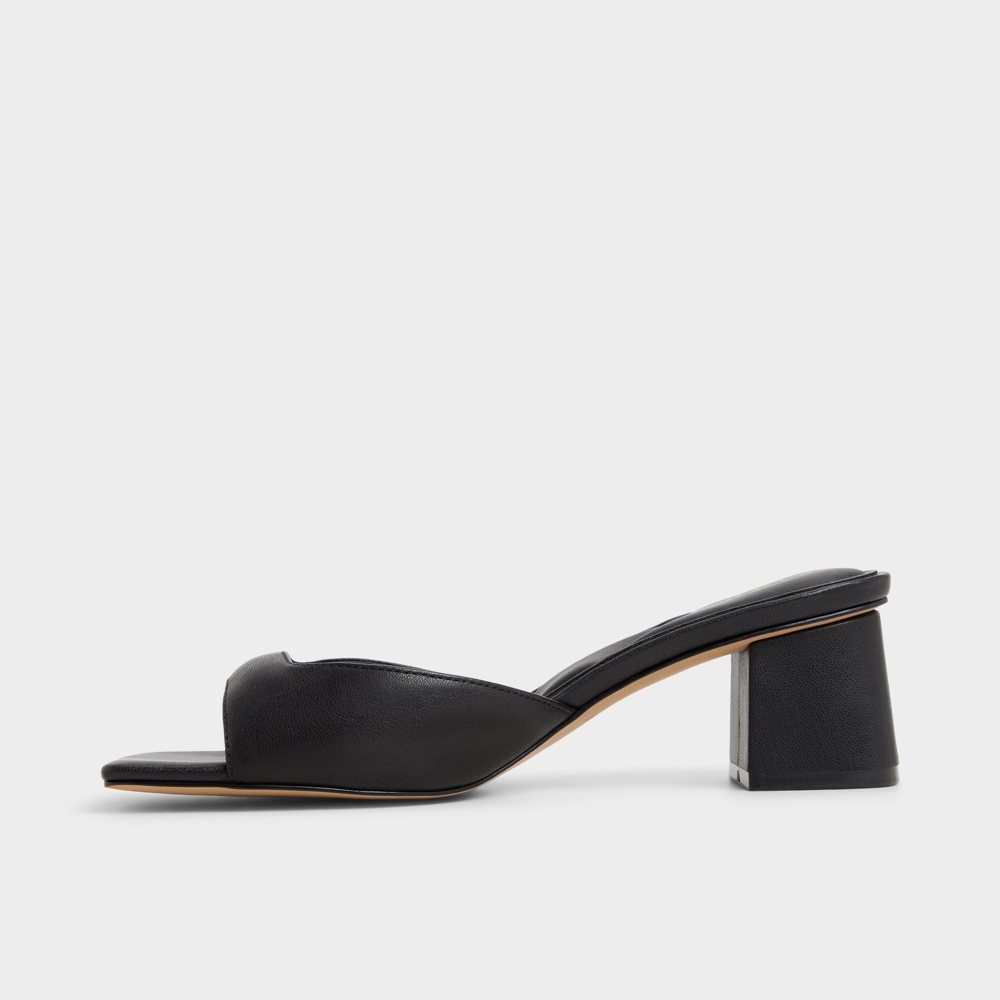 Side view of Black Aneky Heeled mule