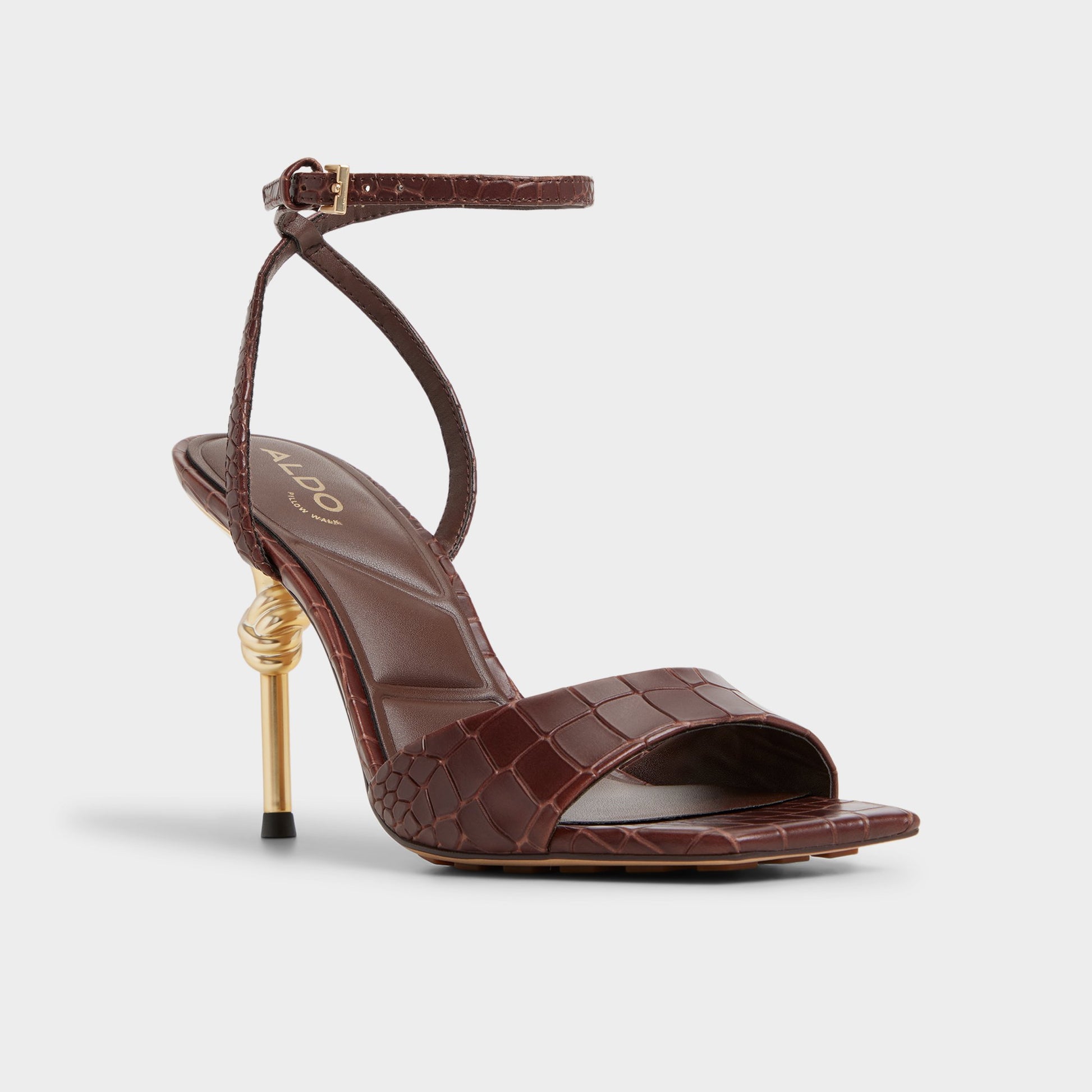 Three-quarter angle of Dark Brown Harmonious Strappy heeled sandal's front side