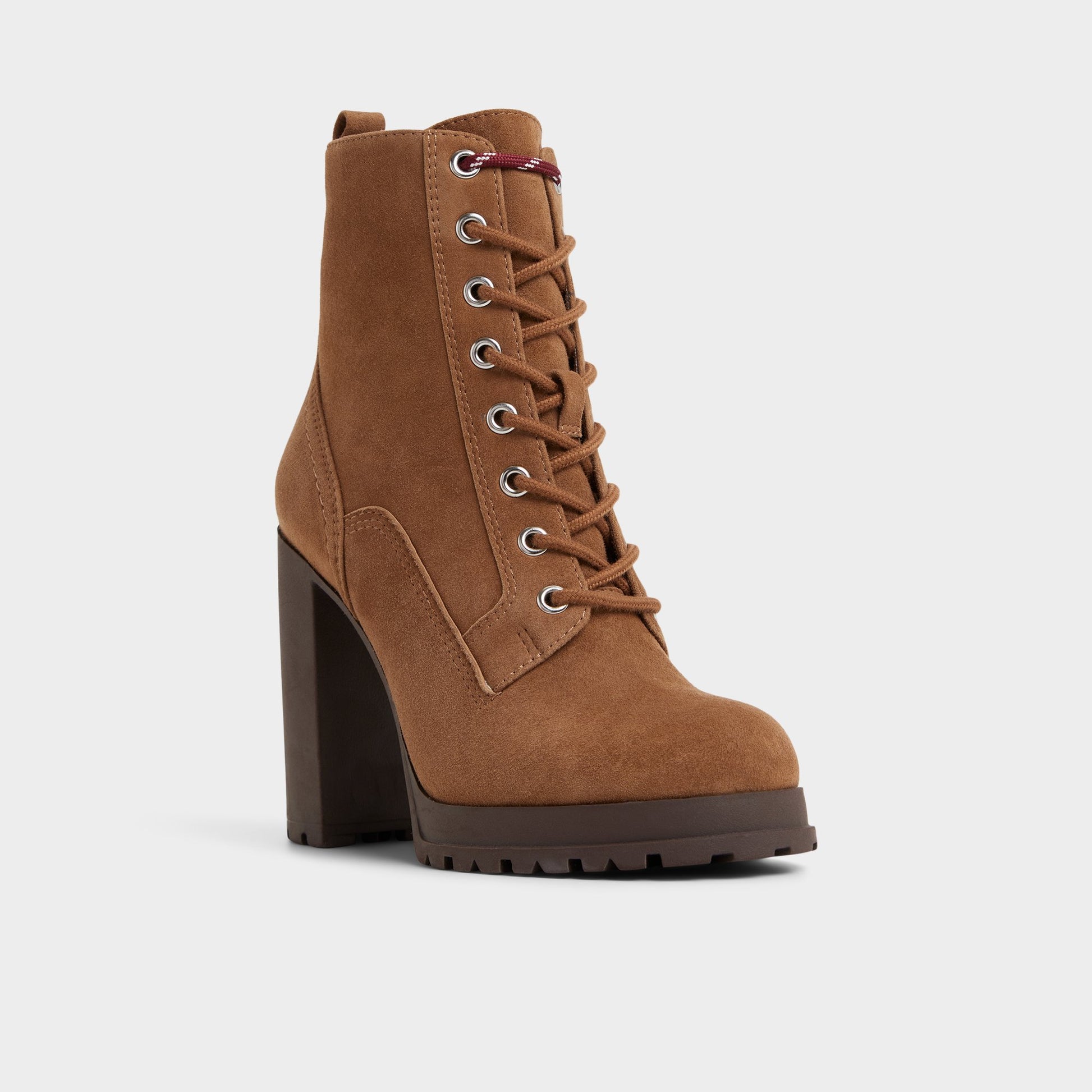Three-quarter angle of Light Brown Rebelliously Combat ankle boot's front side