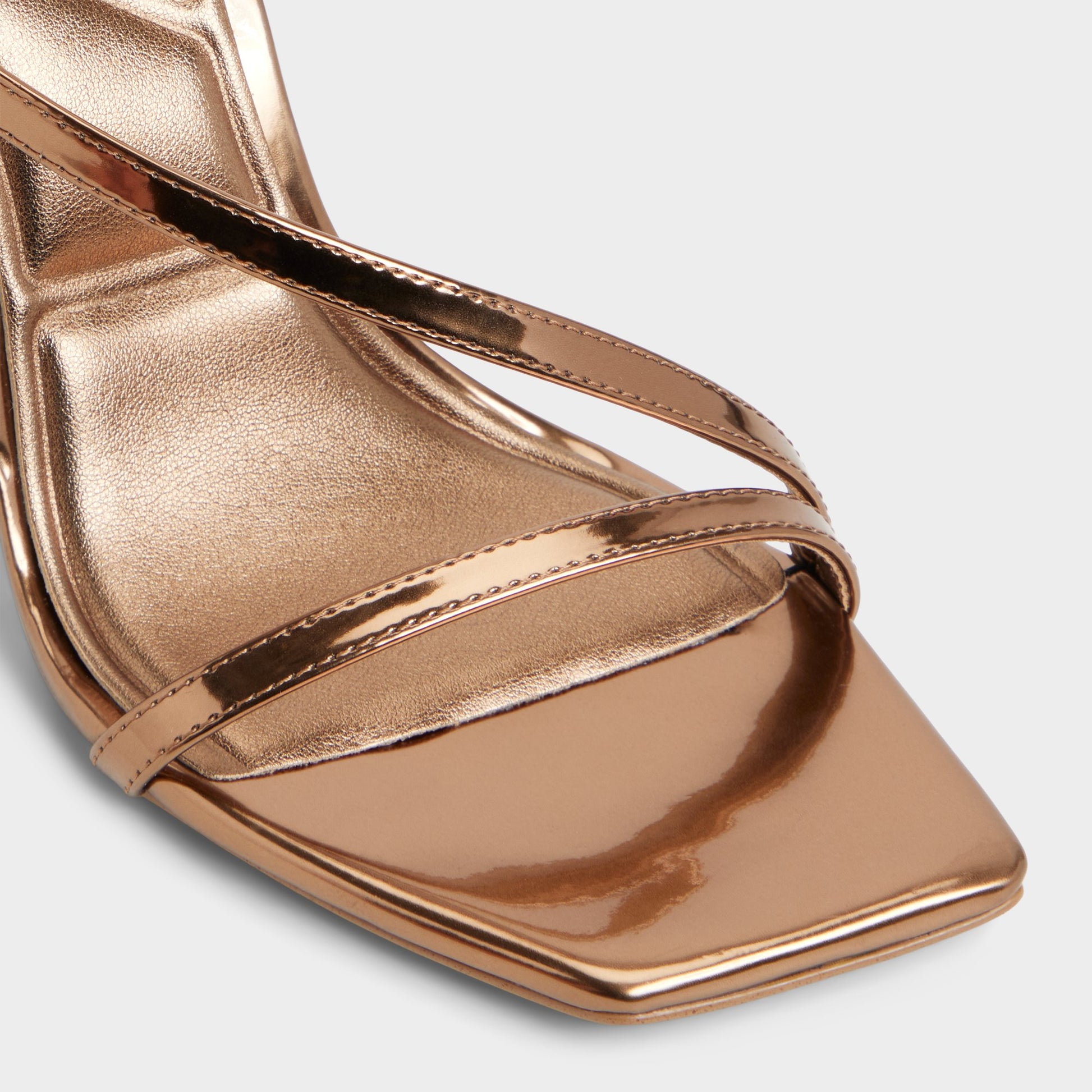 Close-up of the Bronze Scintilla Heeled sandal