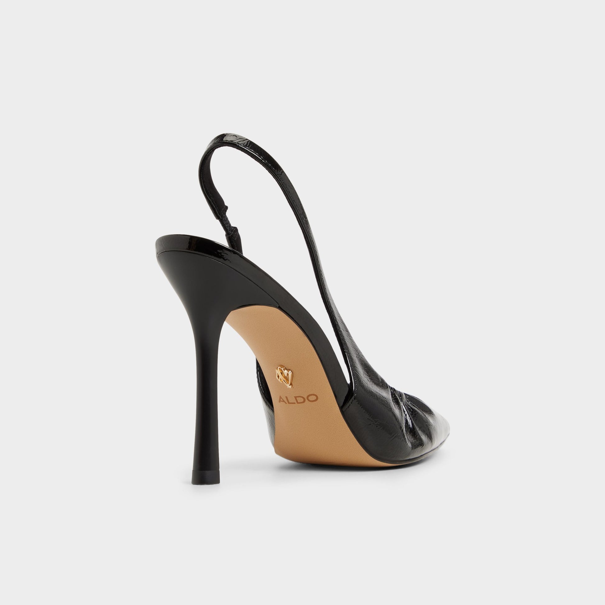 Three-quarter angle of Black Mystie Slingback heel's back side