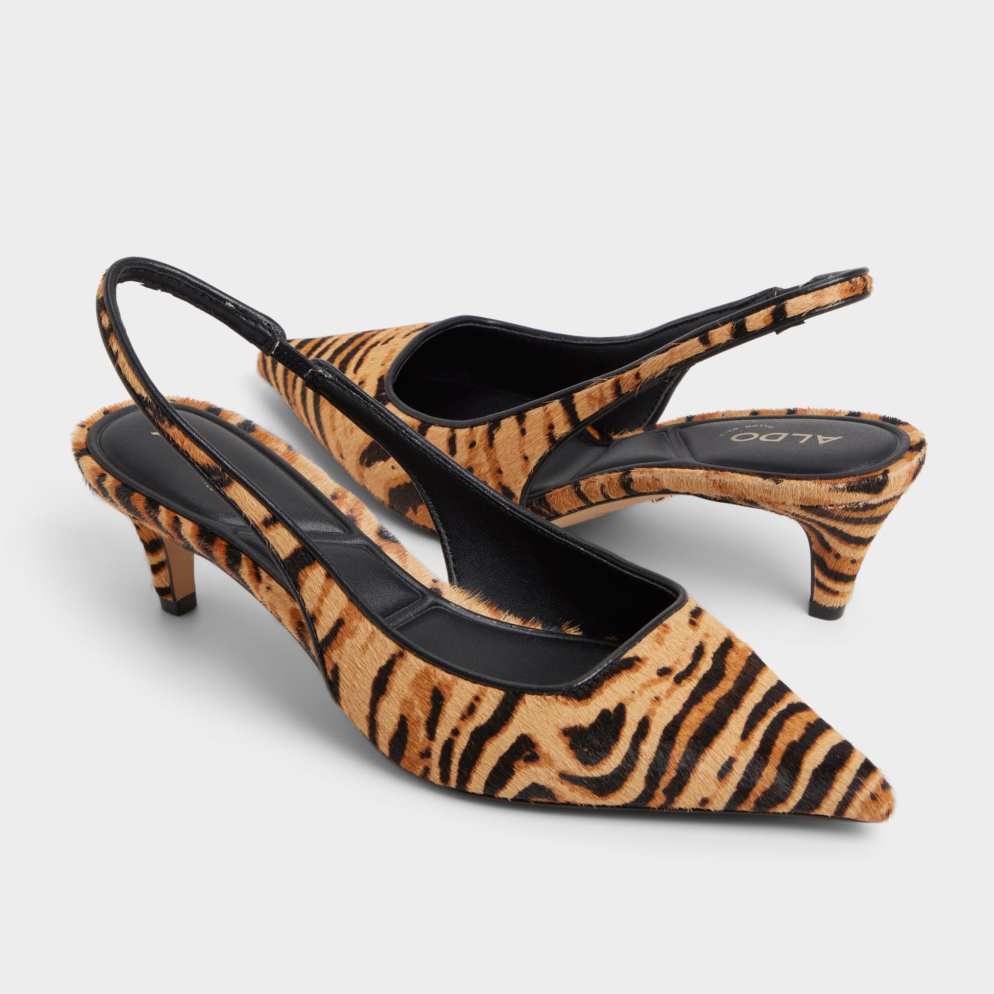 Highlighted view of a pair of Open Brown Leanah Slingback heels