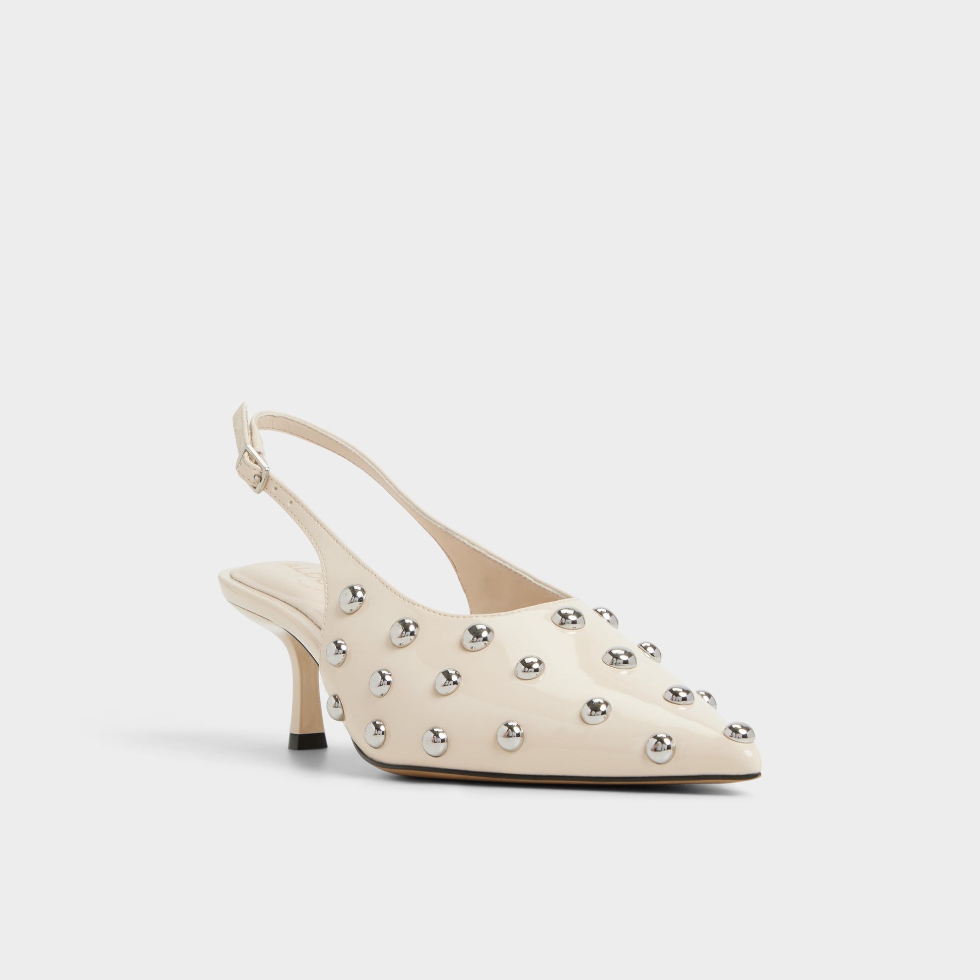 Three-quarter angle of Cream Naiarah Slingback heel's front side