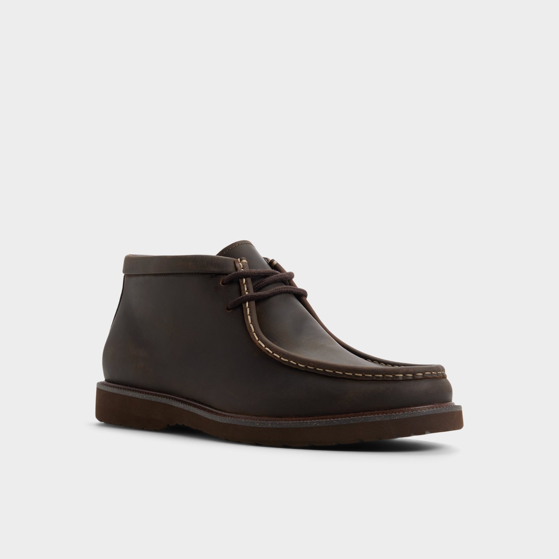 Three-quarter angle of Dark brown Davie Chukka boot's front side