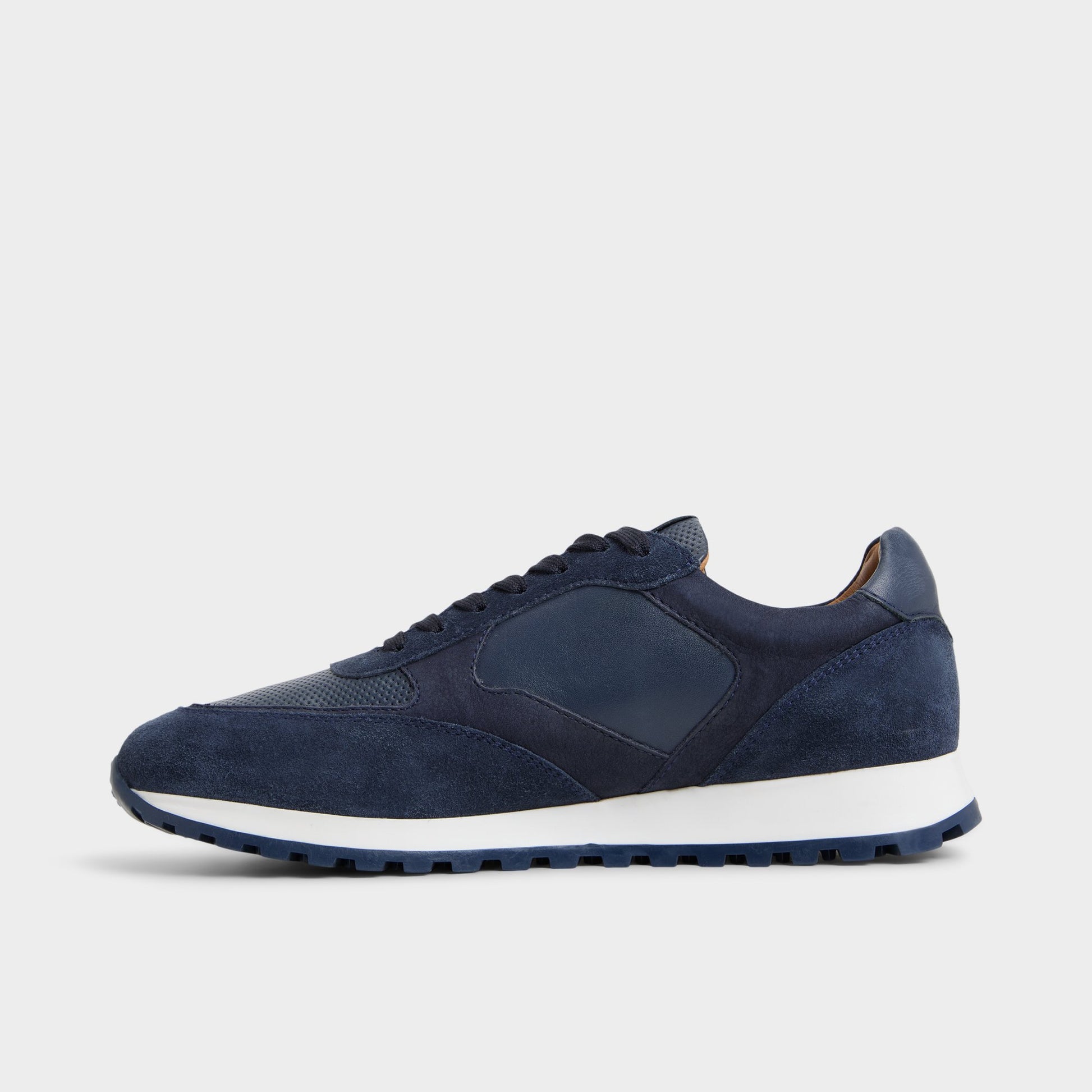 Side view of Navy Gordo Low top sneaker