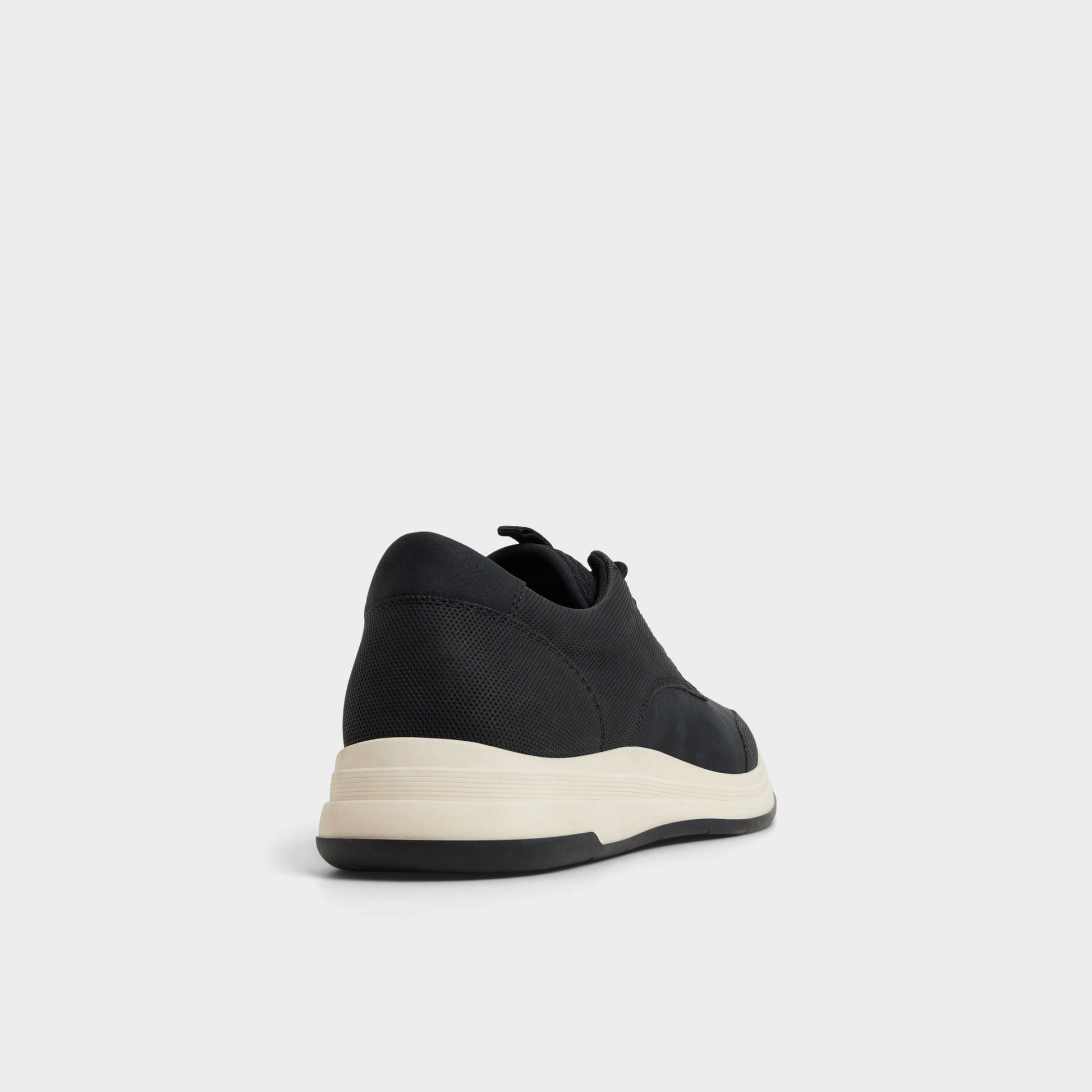 Three-quarter angle of Black Konnor Oxford shoe's back side