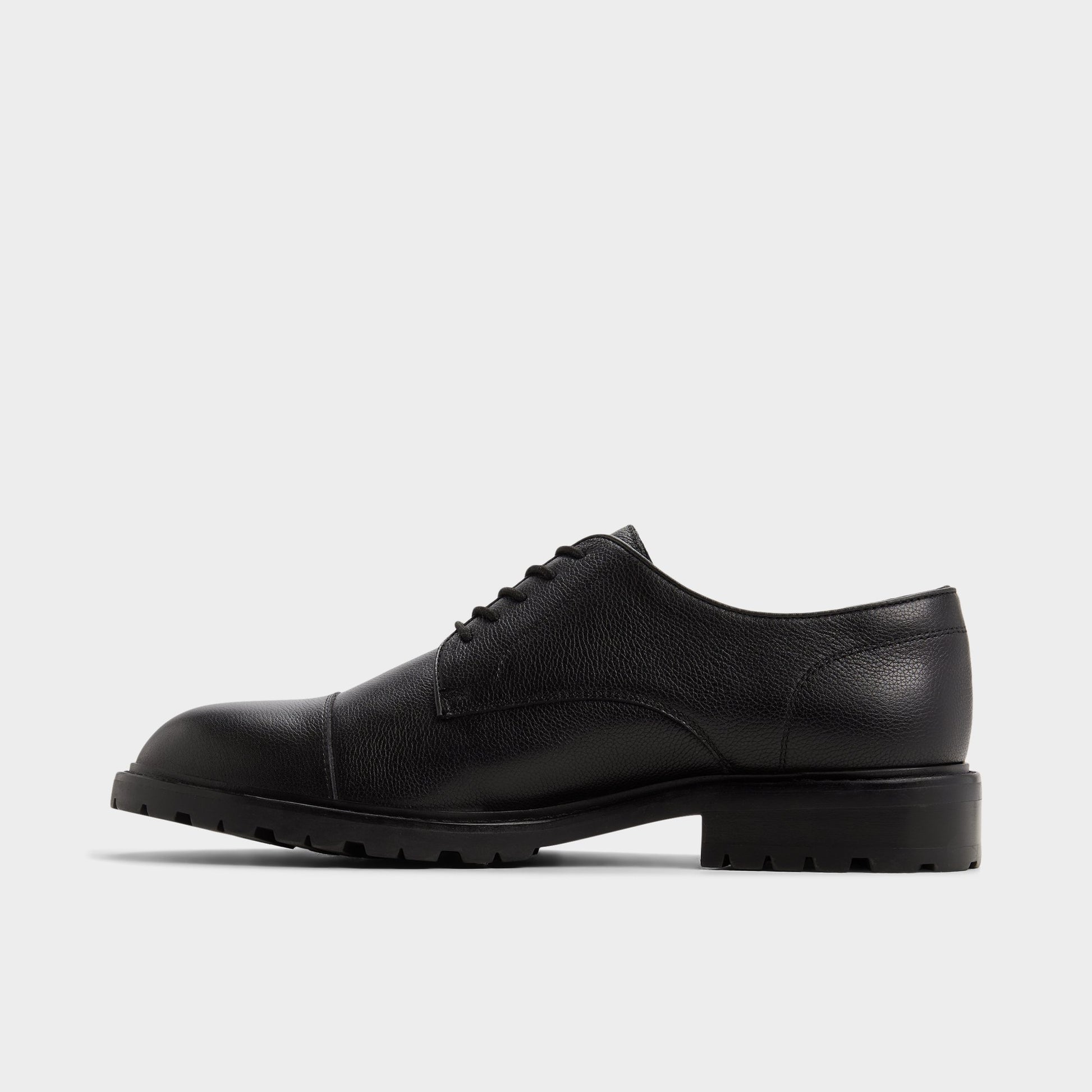 Side view of Black Ferruci Derby shoe