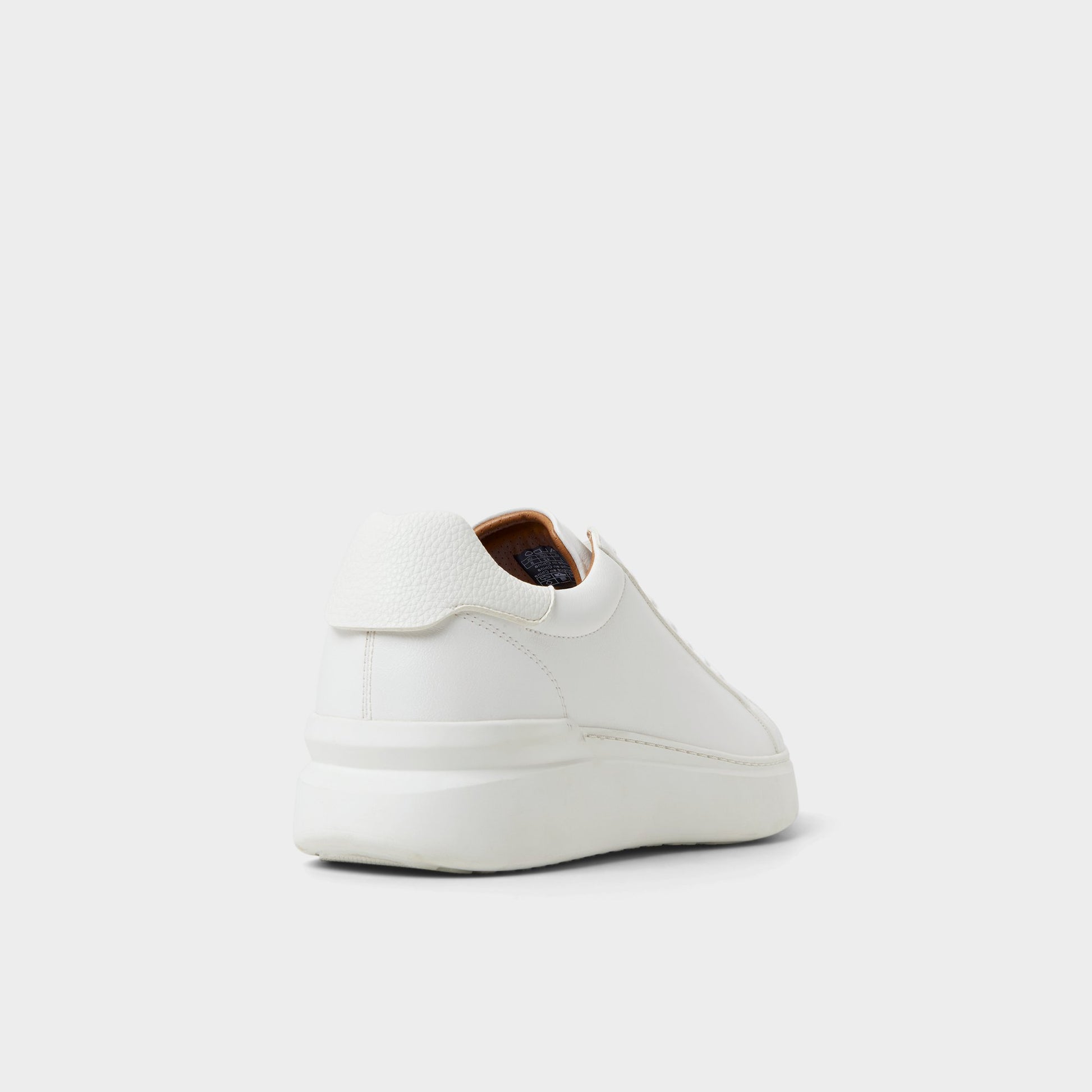 Three-quarter angle of White Toddy Low top sneaker's back side
