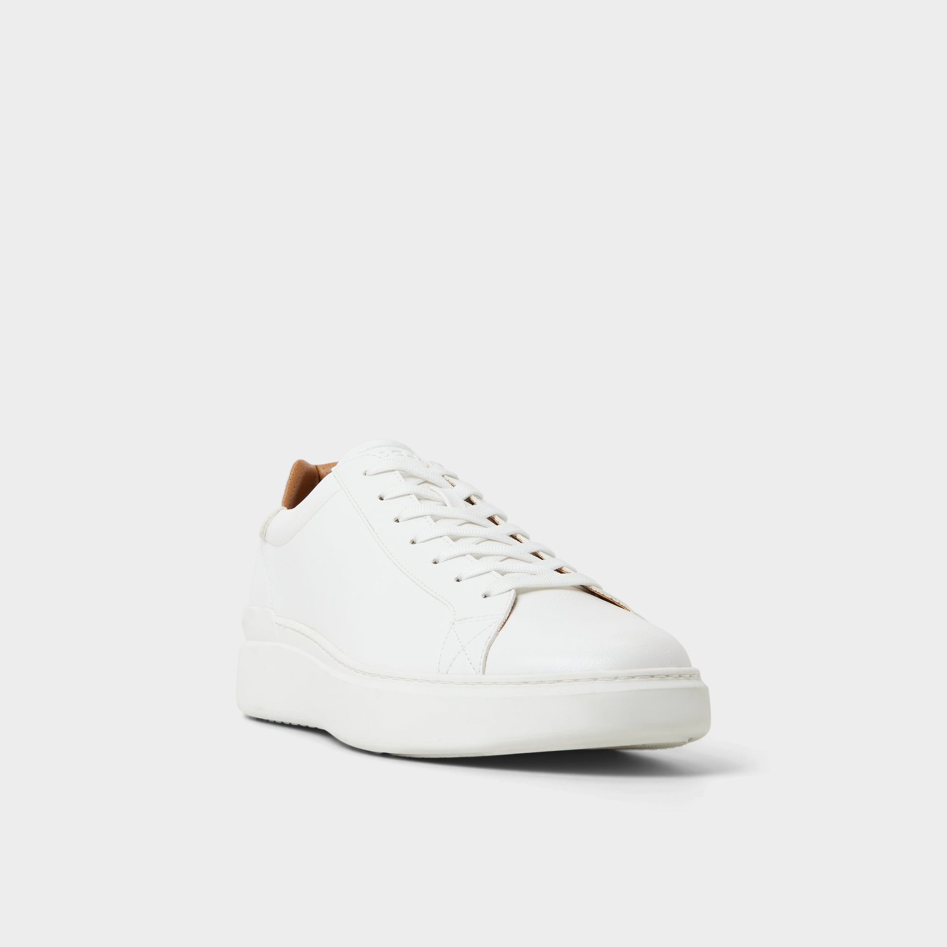 Three-quarter angle of White Toddy Low top sneaker's front side