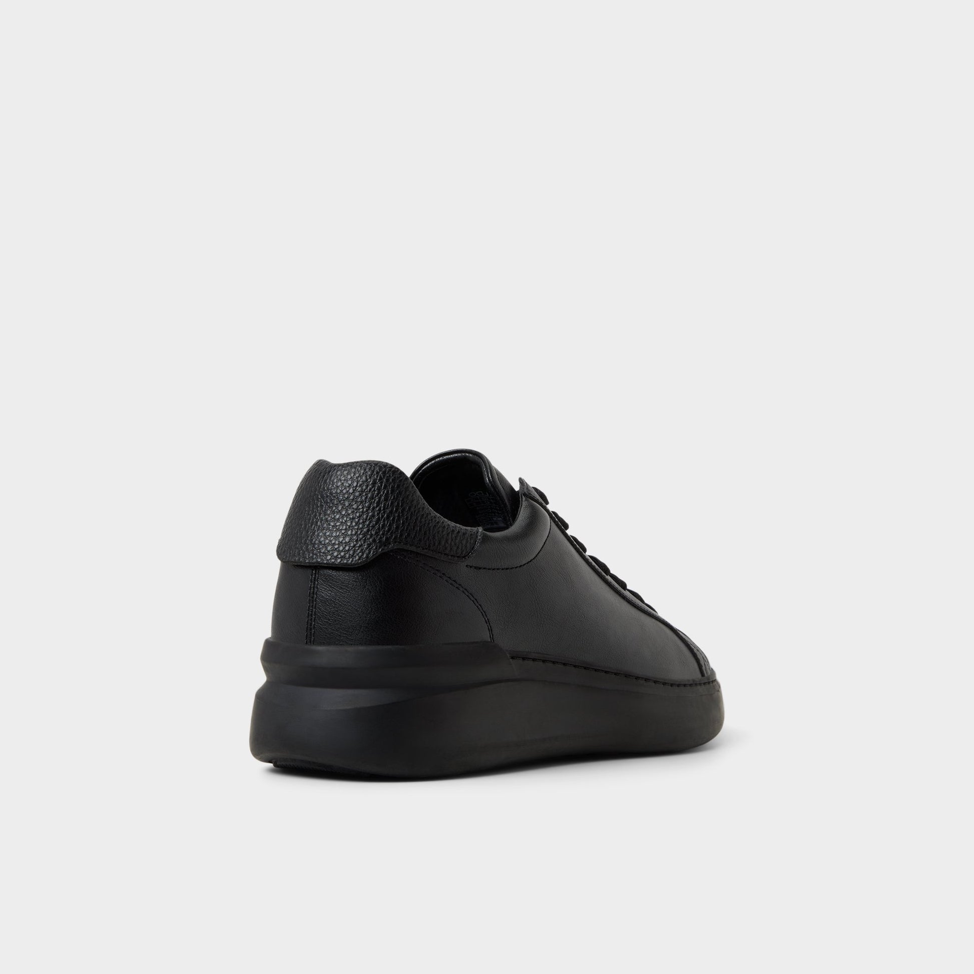 Three-quarter angle of Black/Black Toddy Oxford shoe's back side