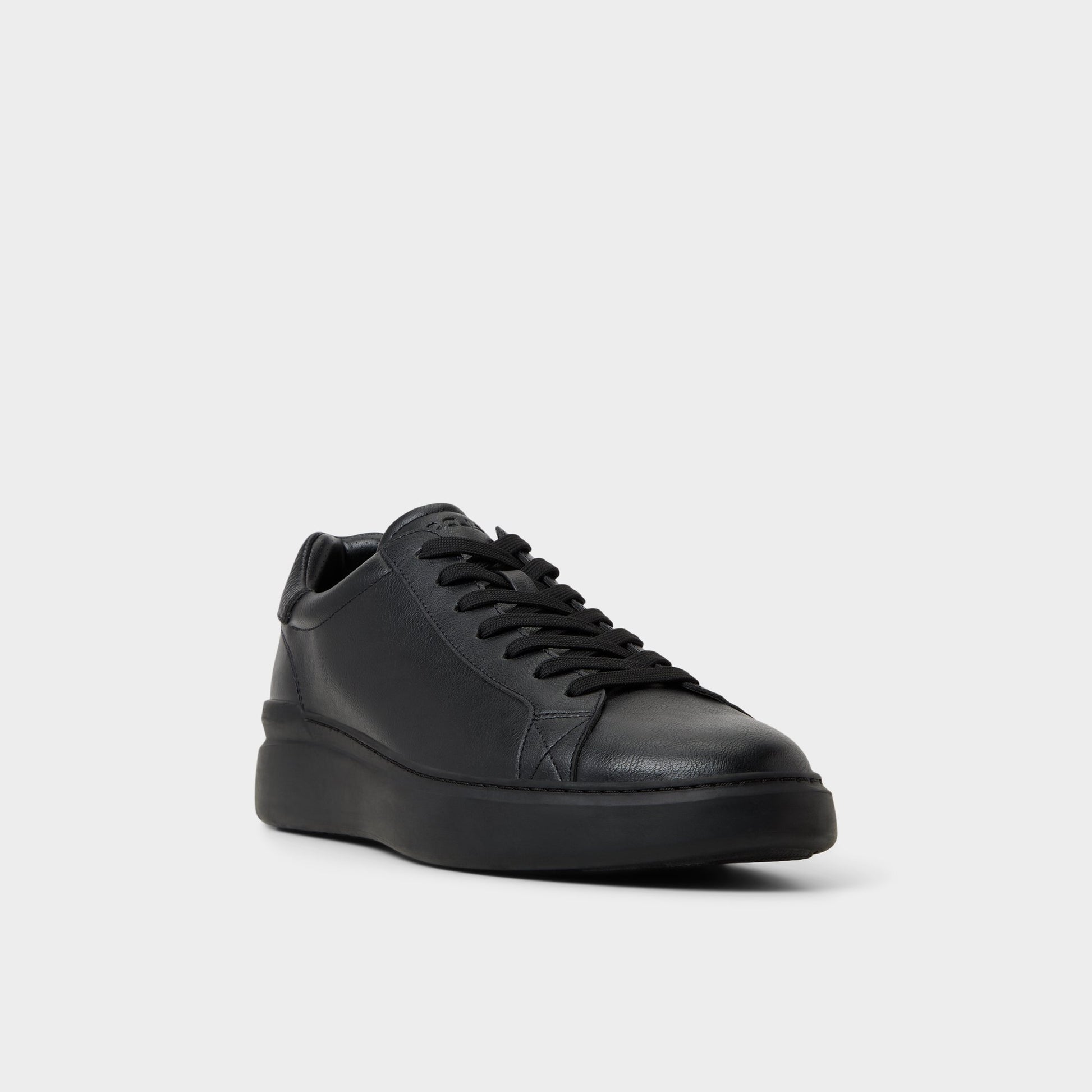Three-quarter angle of Black/Black Toddy Oxford shoe's front side