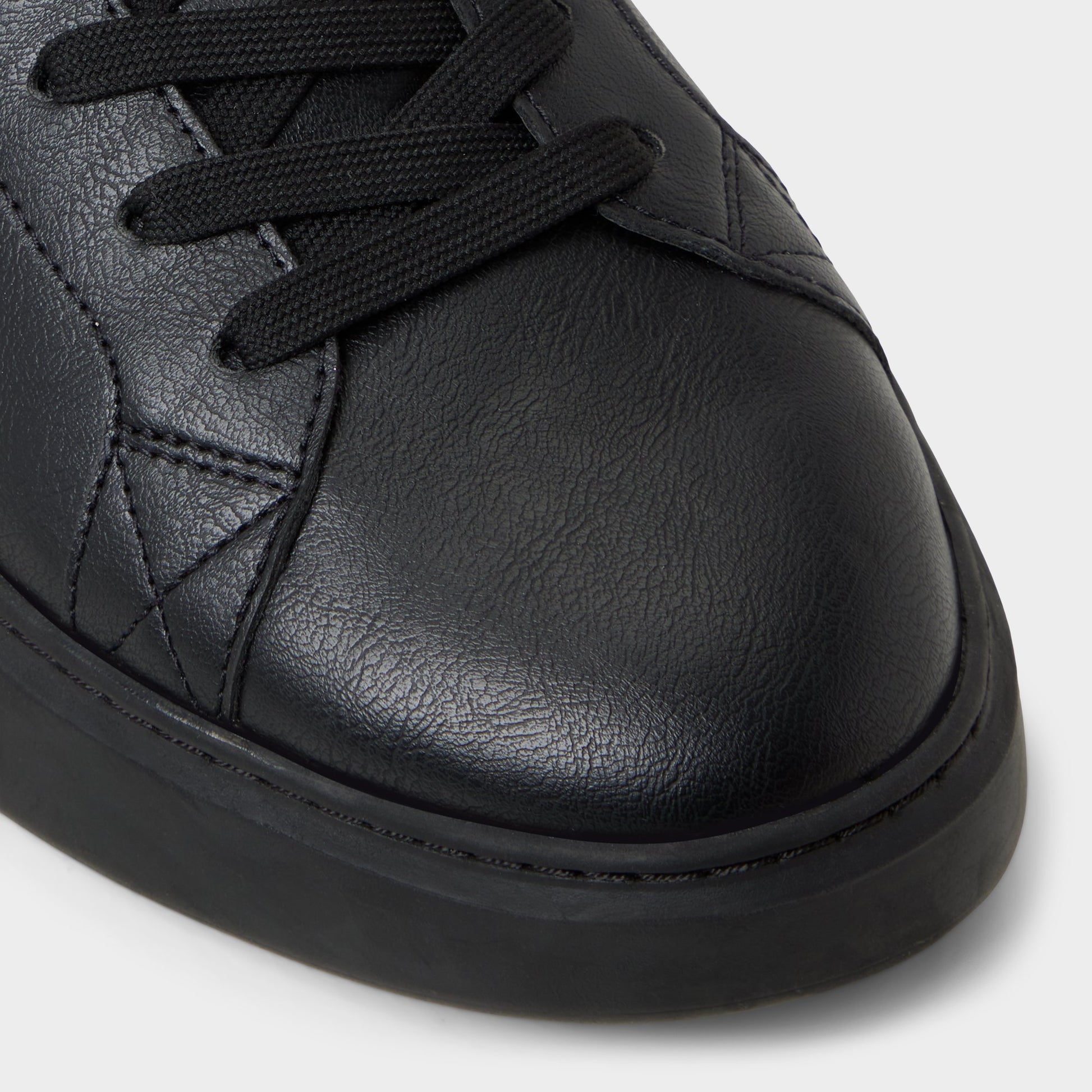 Close-up of the Black/Black Toddy Oxford shoe