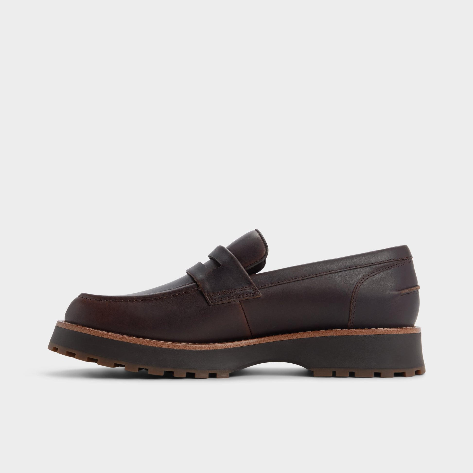 Side view of Dark brown Kole Loafer