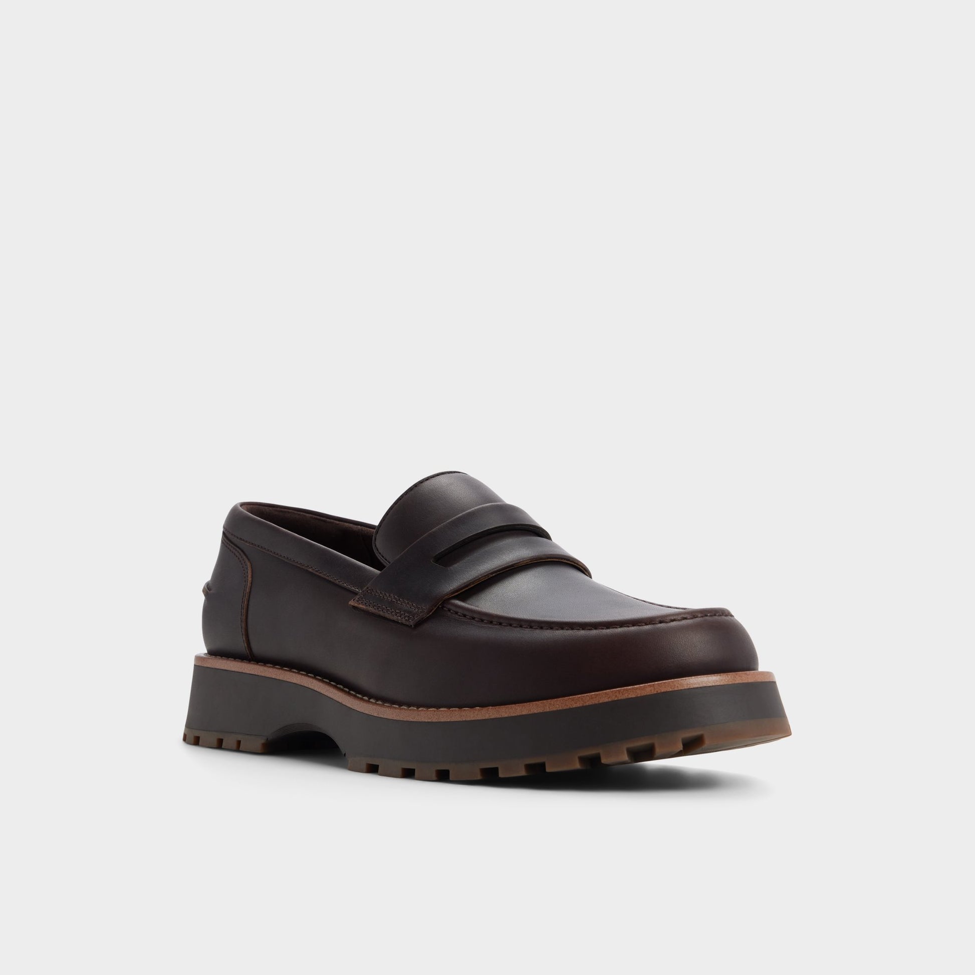 Three-quarter angle of Dark brown Kole Loafer's front side