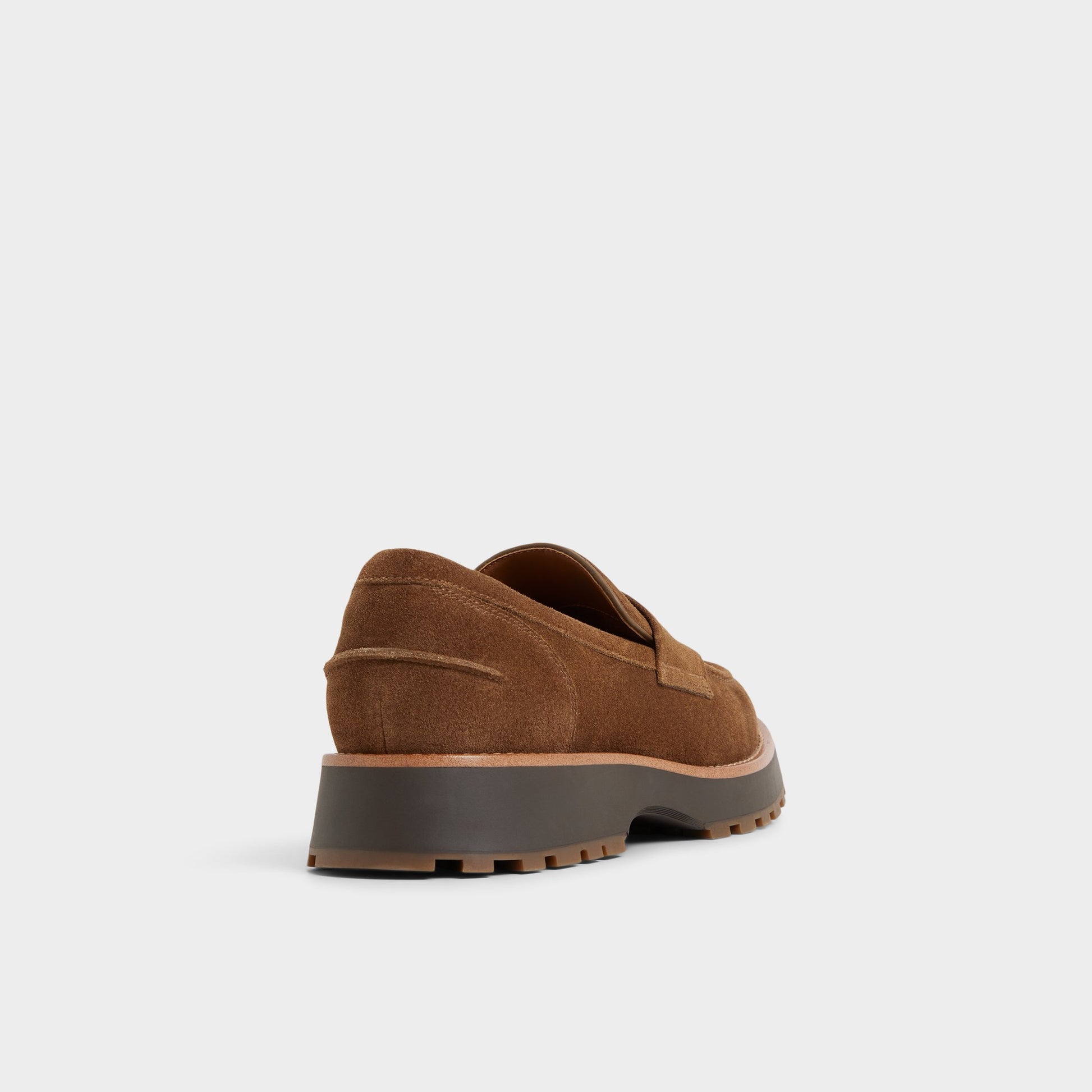 Three-quarter angle of Open Brown Kole Loafer's back side