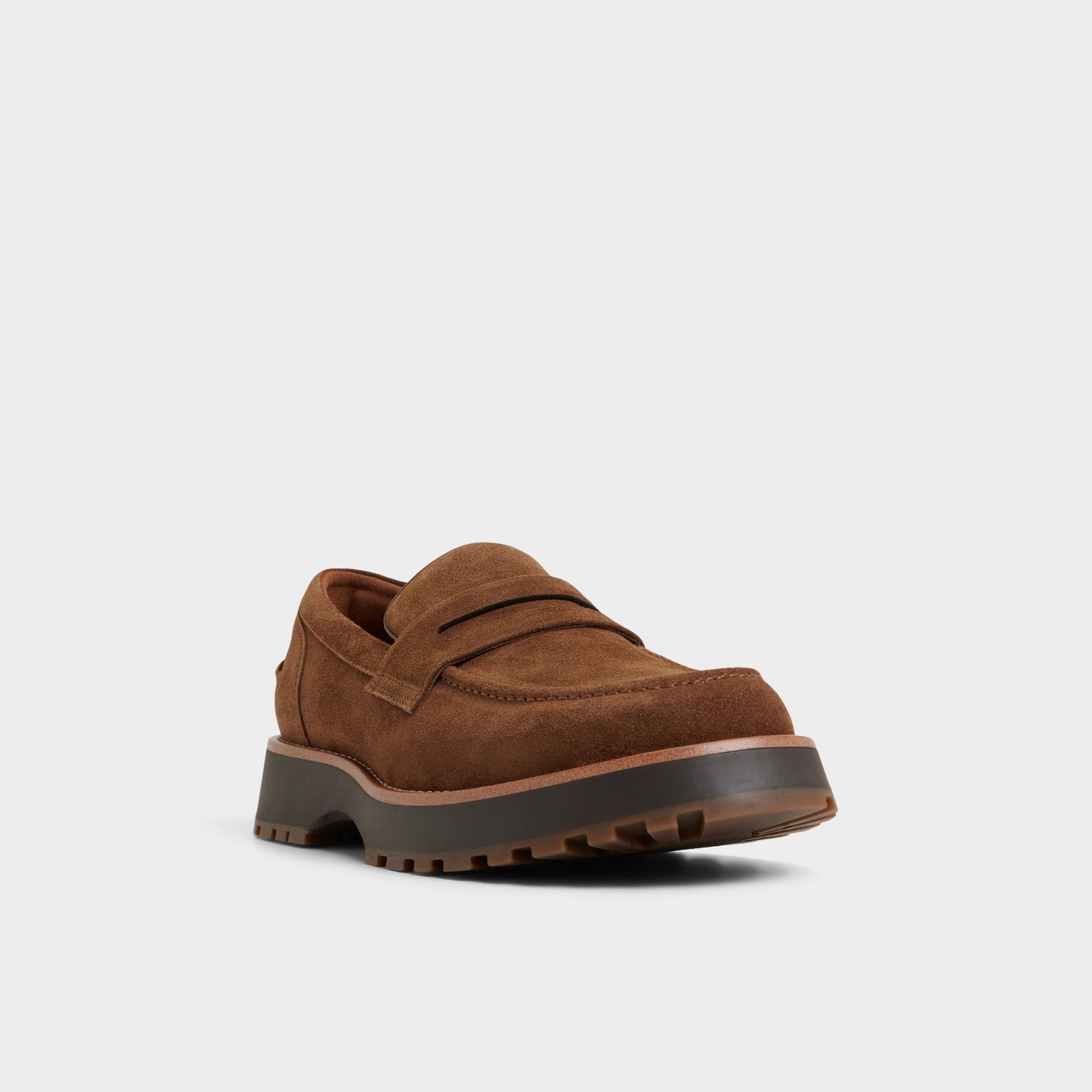 Three-quarter angle of Open Brown Kole Loafer's front side