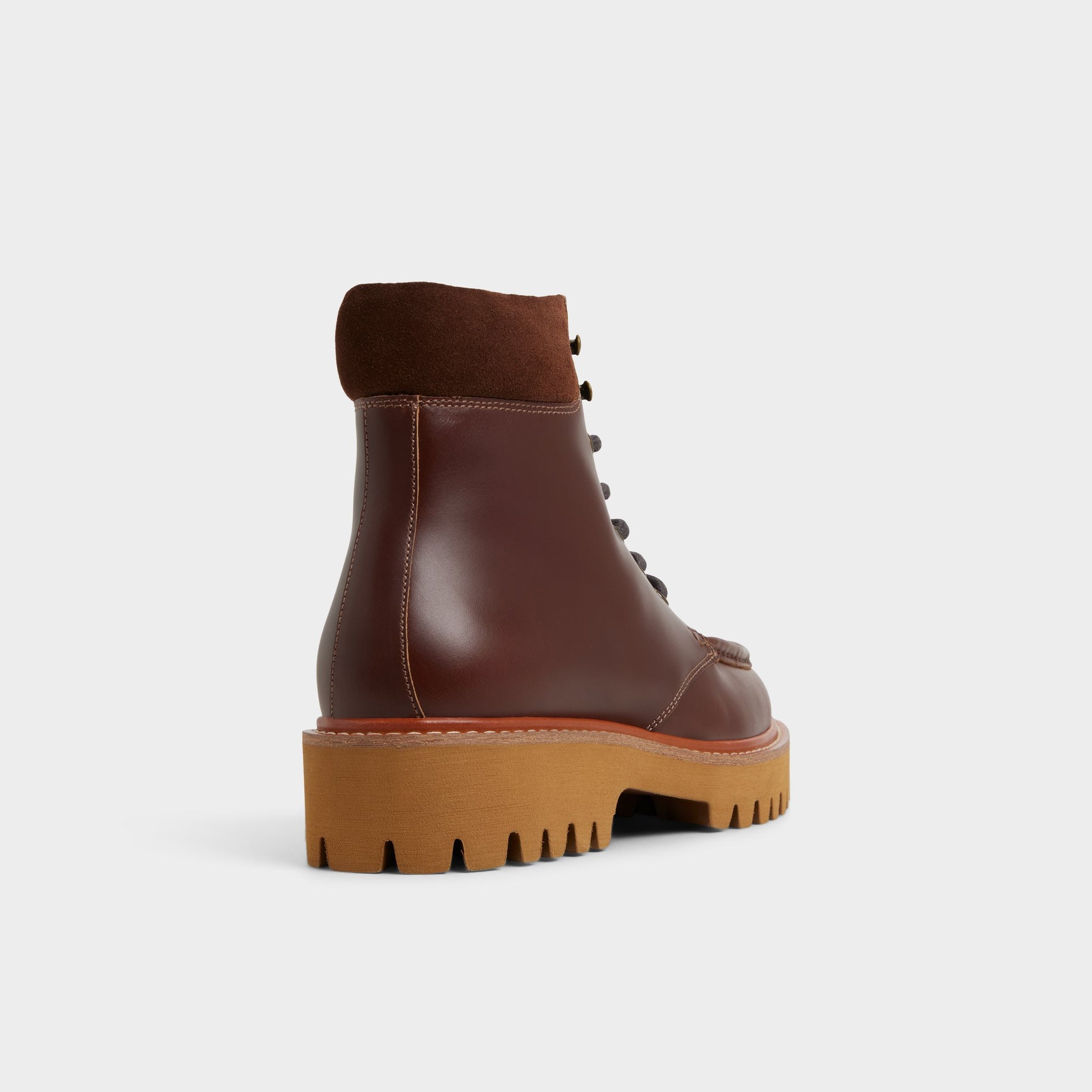 Three-quarter angle of Medium brown Grier Combat boot's back side
