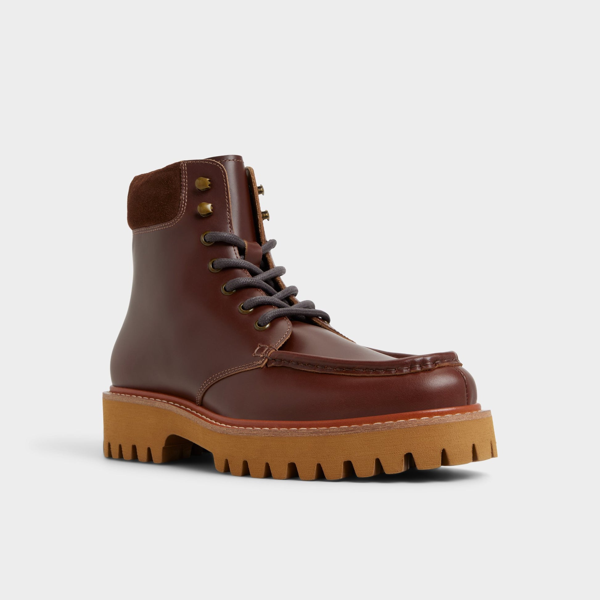 Three-quarter angle of Medium brown Grier Combat boot's front side
