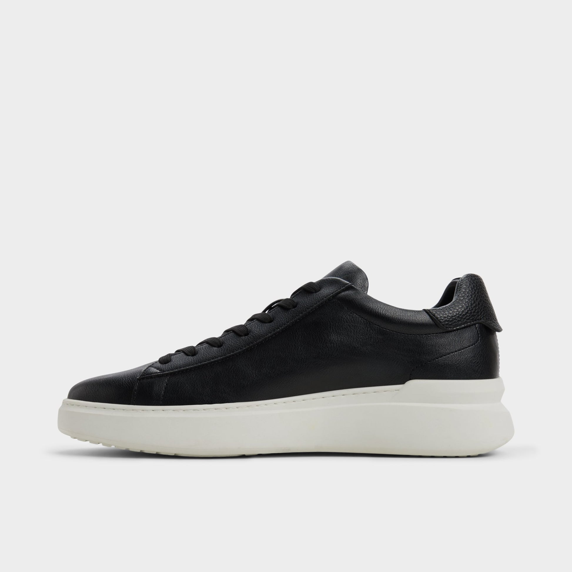 Side view of Black Paxon Low top sneaker