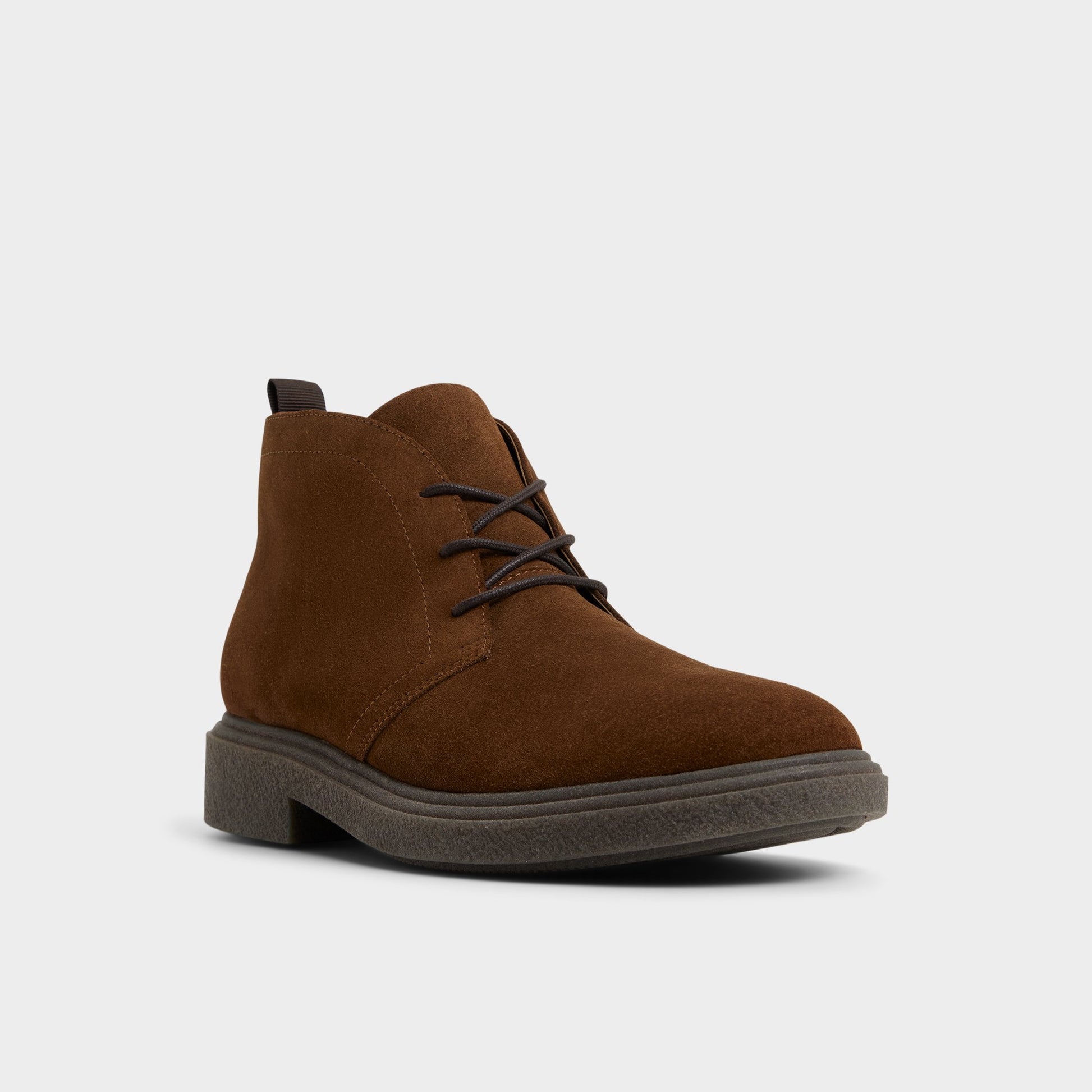 Three-quarter angle of Open brown Torro Chukka boot's front side