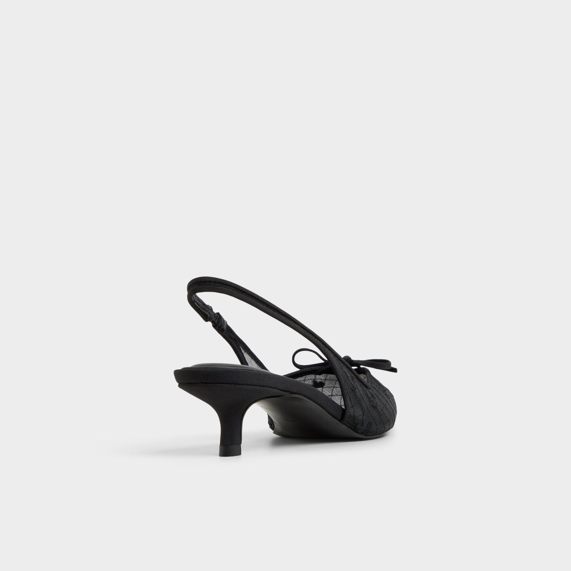 Three-quarter angle of Other black Azaro Slingback heel's back side