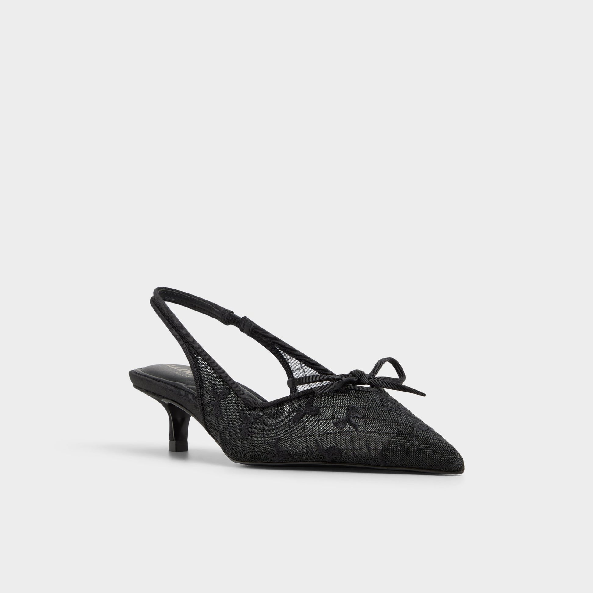 Three-quarter angle of Other black Azaro Slingback heel's front side