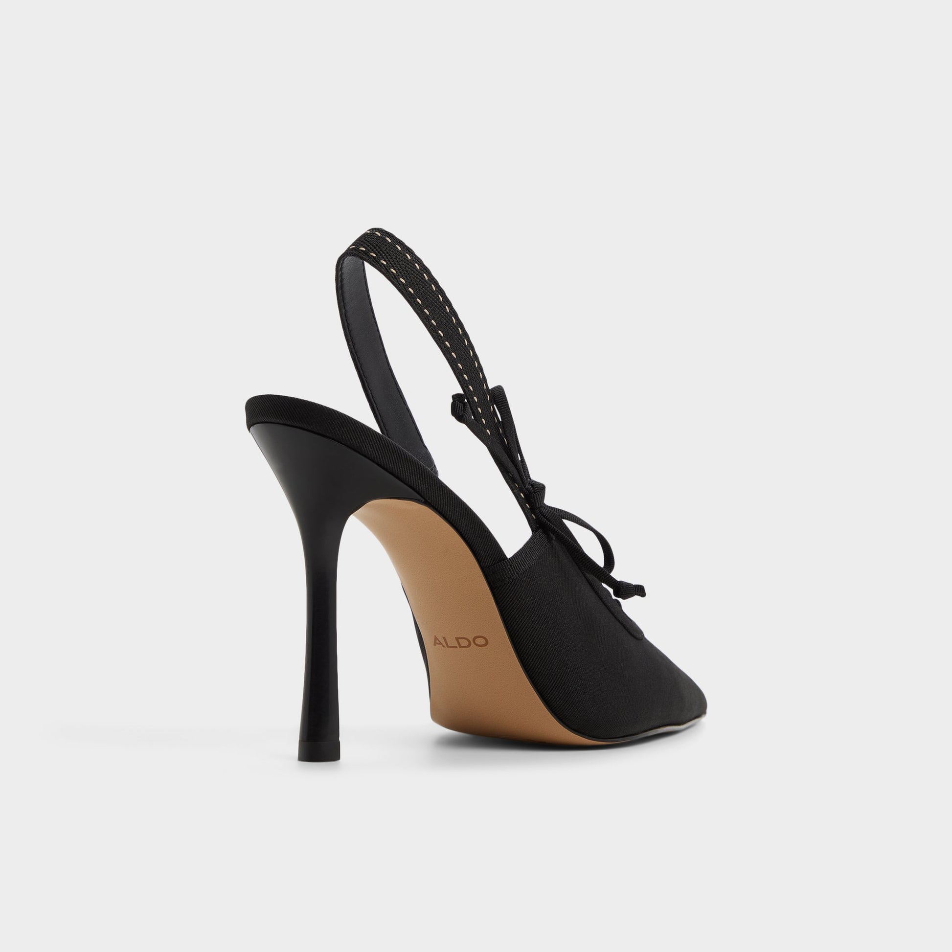 Three-quarter angle of Other black Hennie Slingback heel's back side