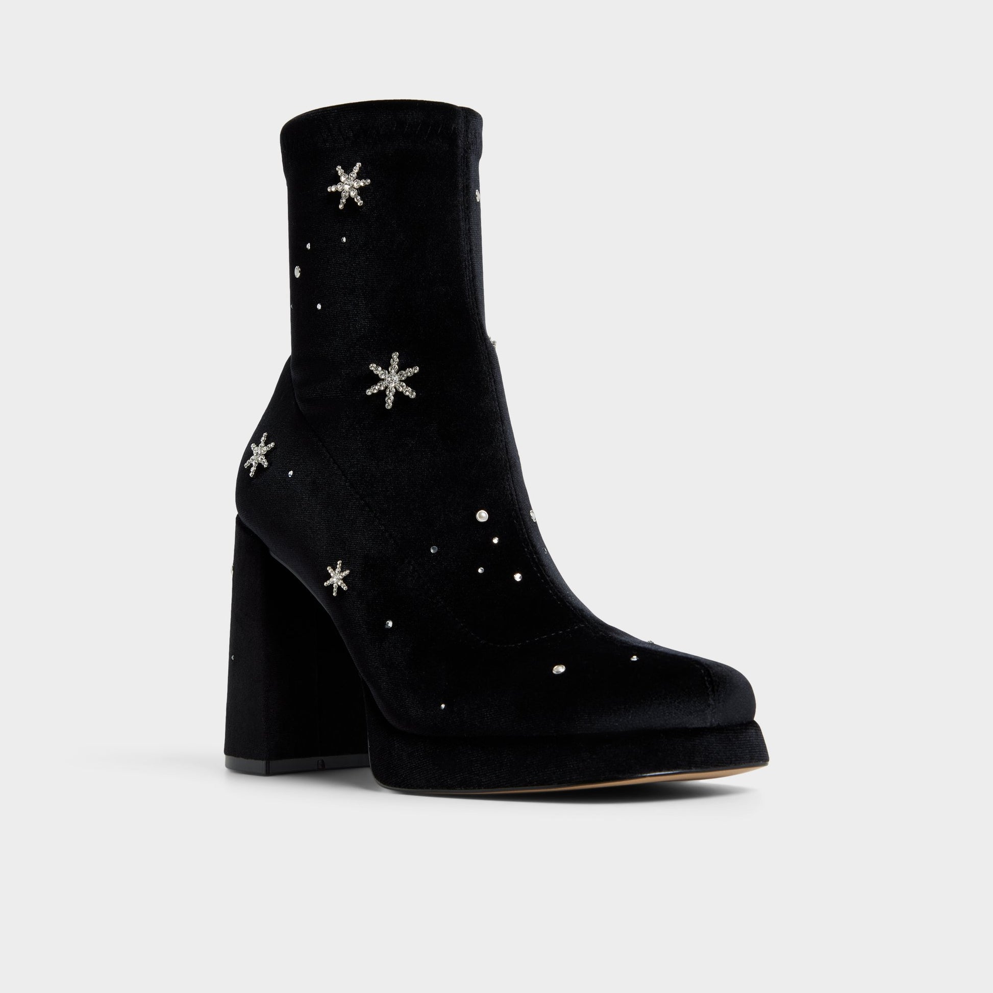 Three-quarter angle of Black Starrie Ankle boot's front side