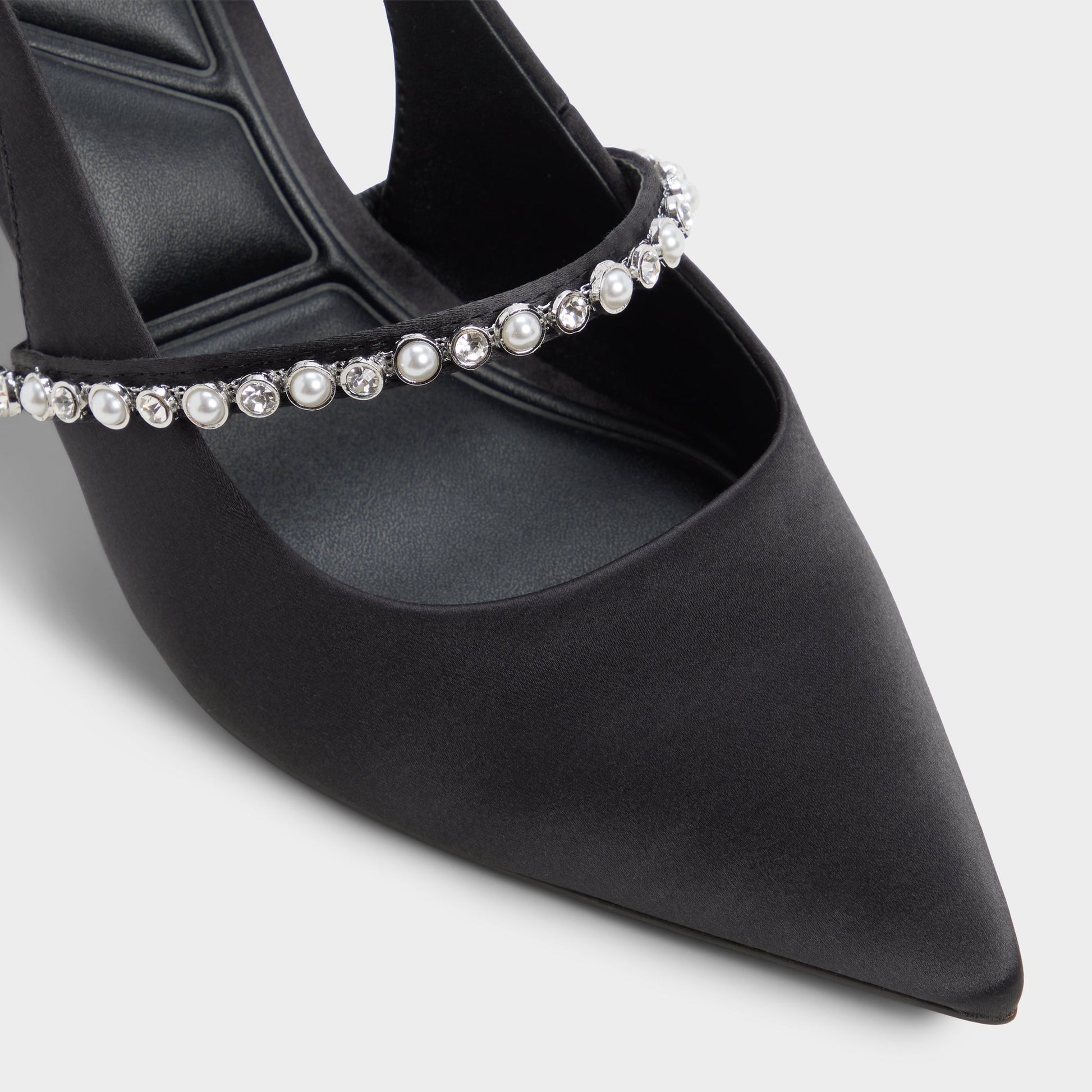 Close-up of the Other Black Vestia Slingback heel