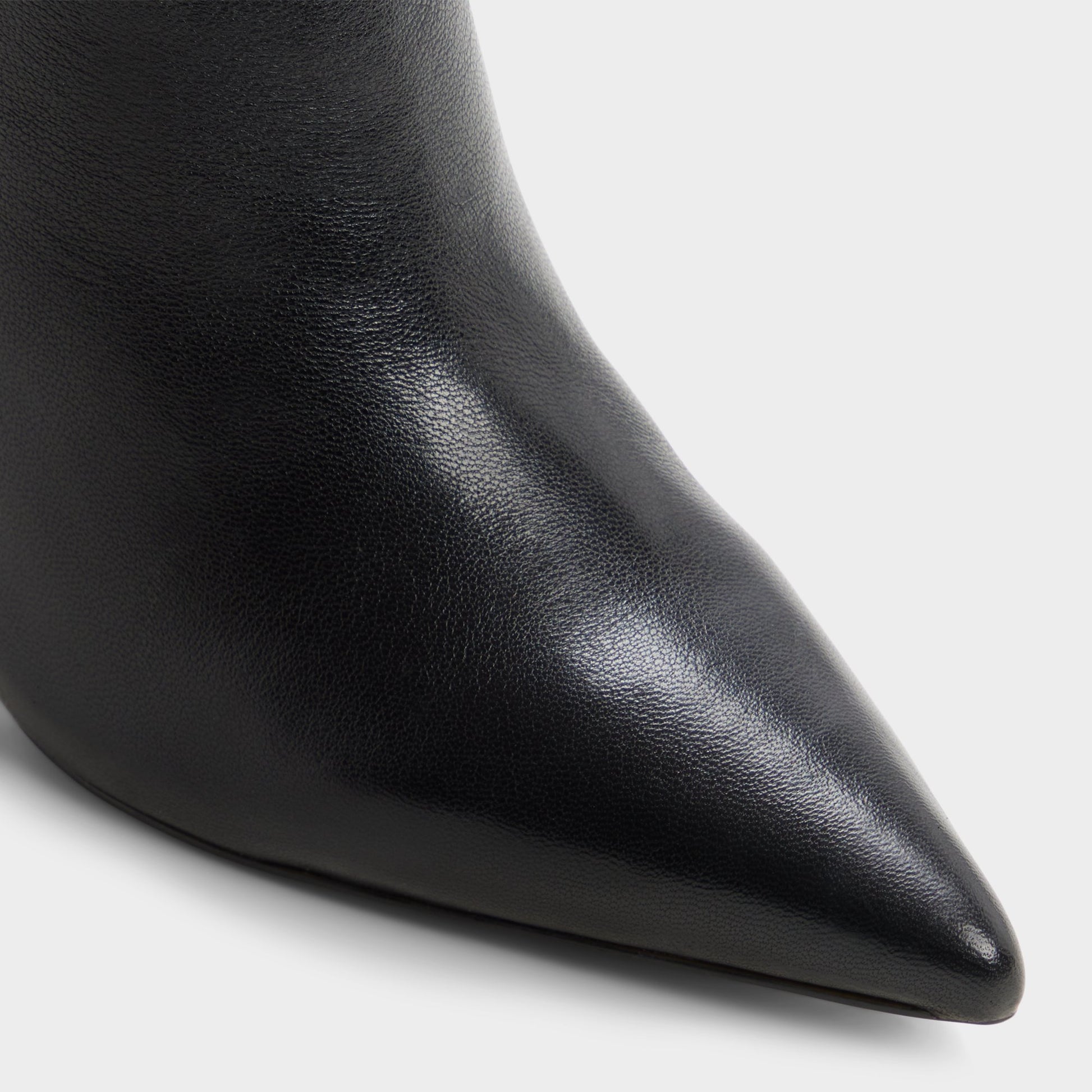 Close-up of the Other black Holiis Knee-high boot
