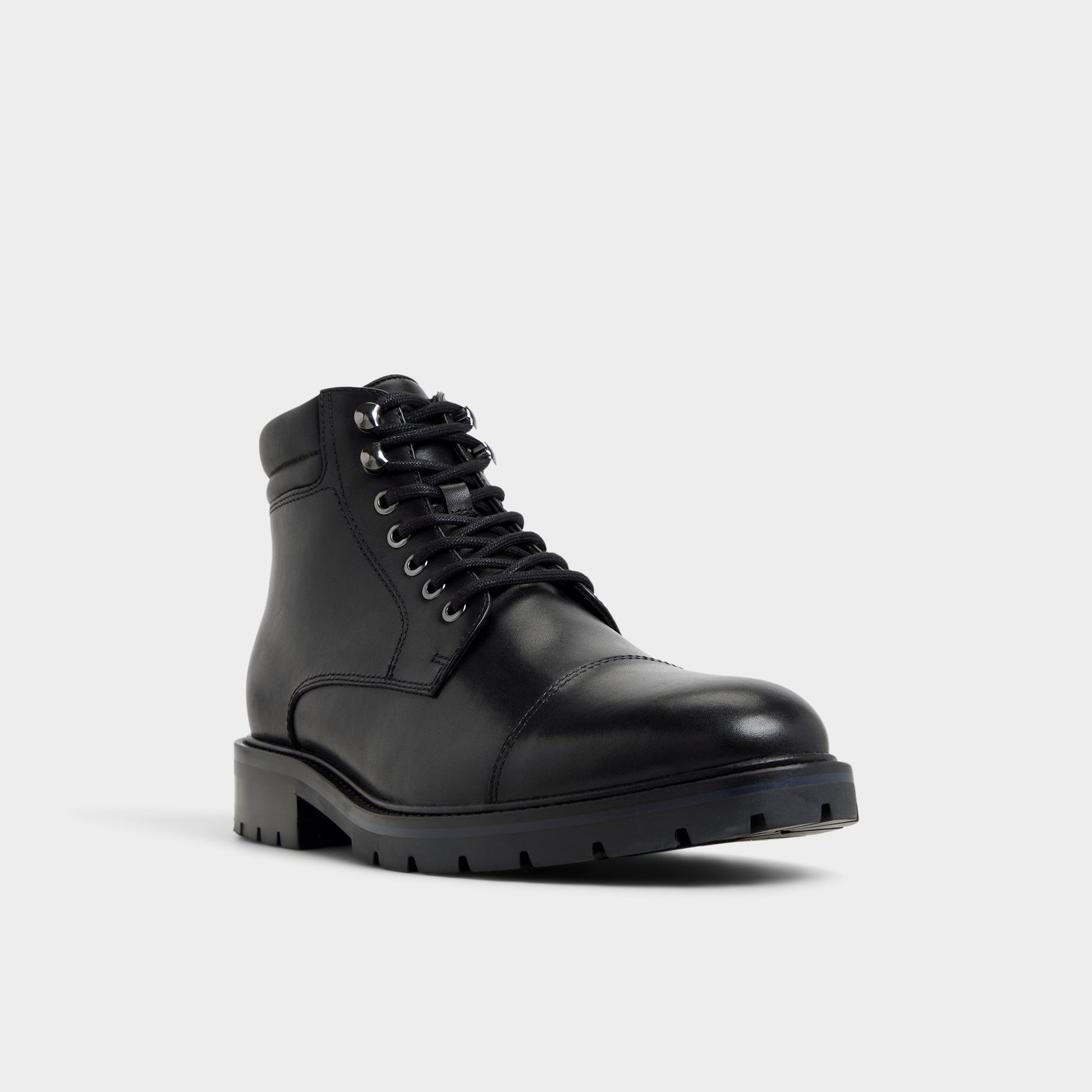Three-quarter angle of Other Black Darion Combat boot's front side