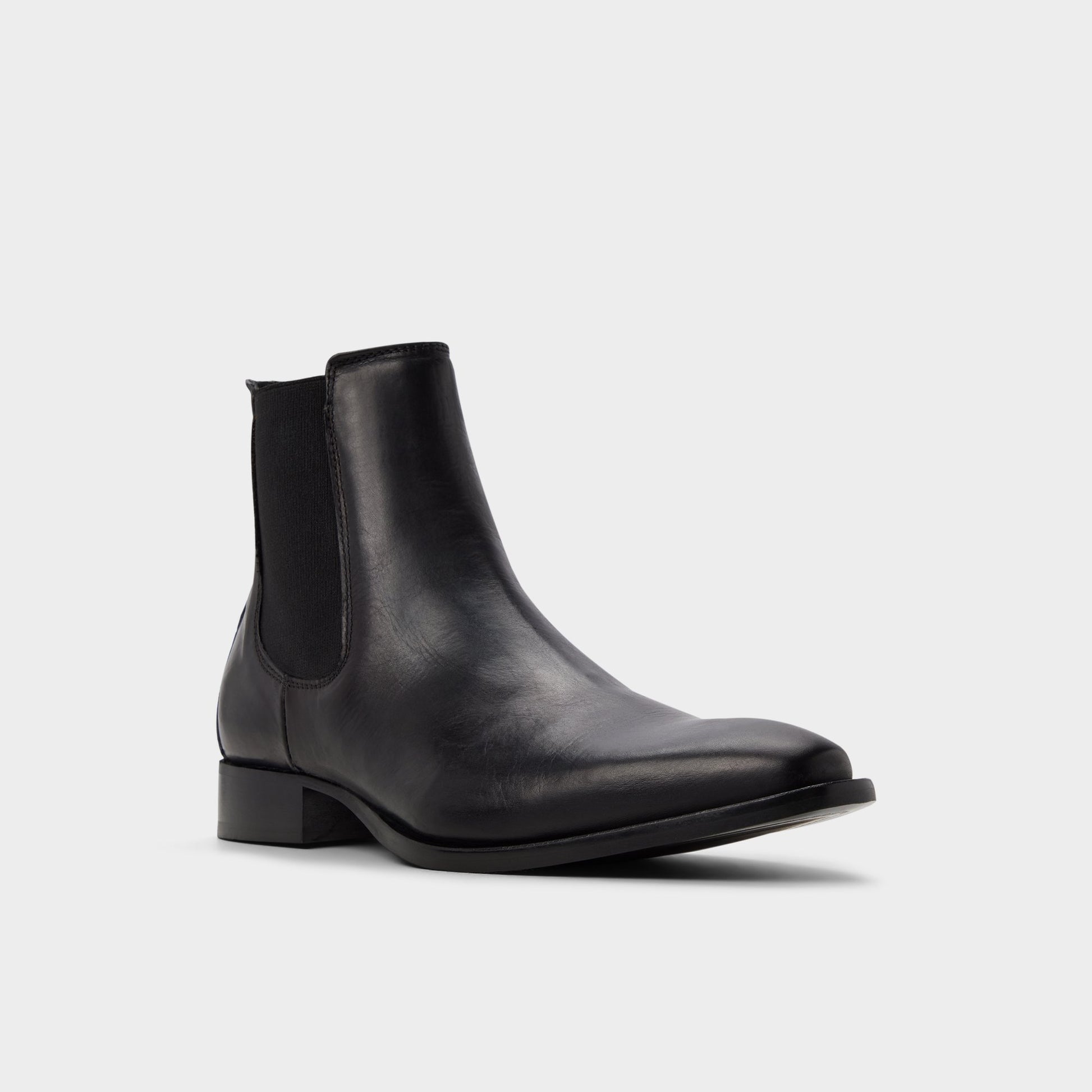 Three-quarter angle of Black Dax Chelsea boot's front side