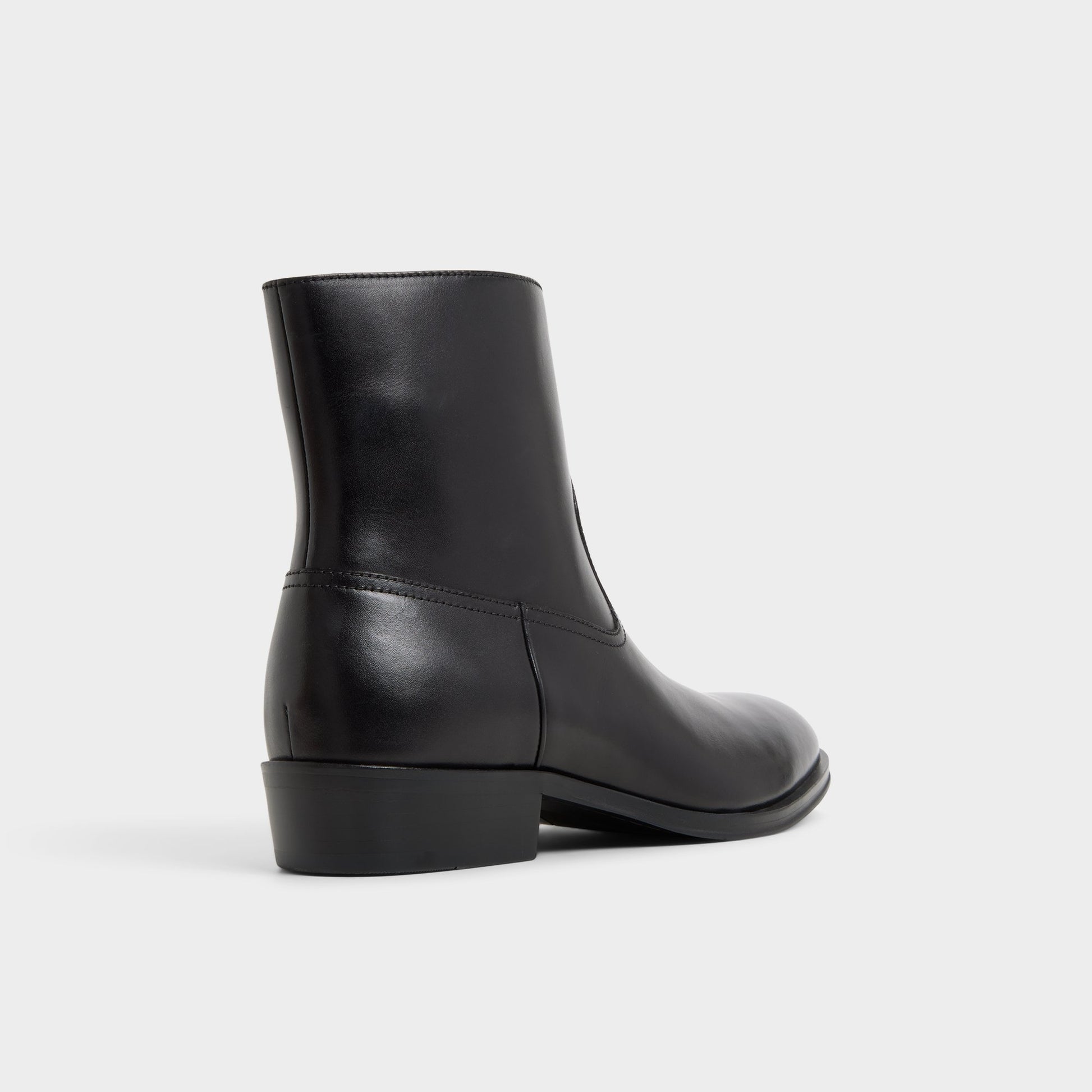 Three-quarter angle of Black Calix Ankle boot's back side