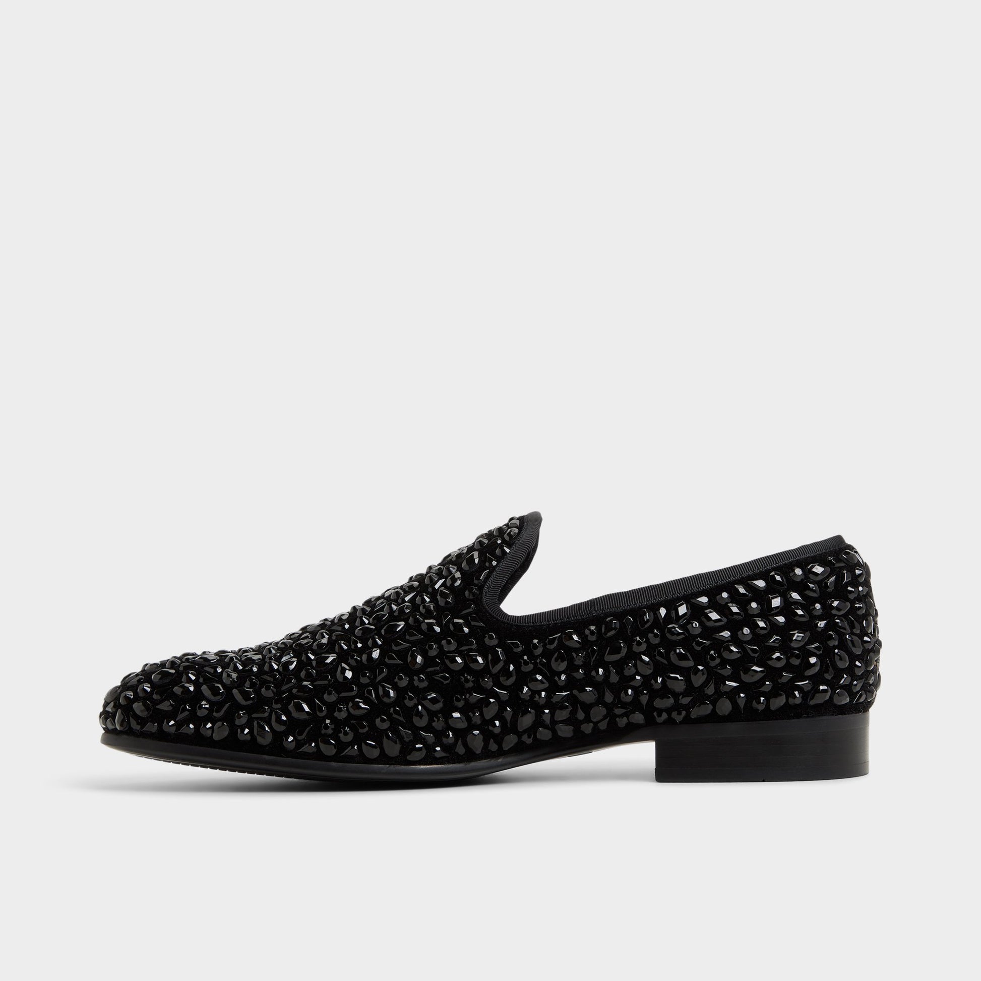 Side view of Black Lux Slip-on