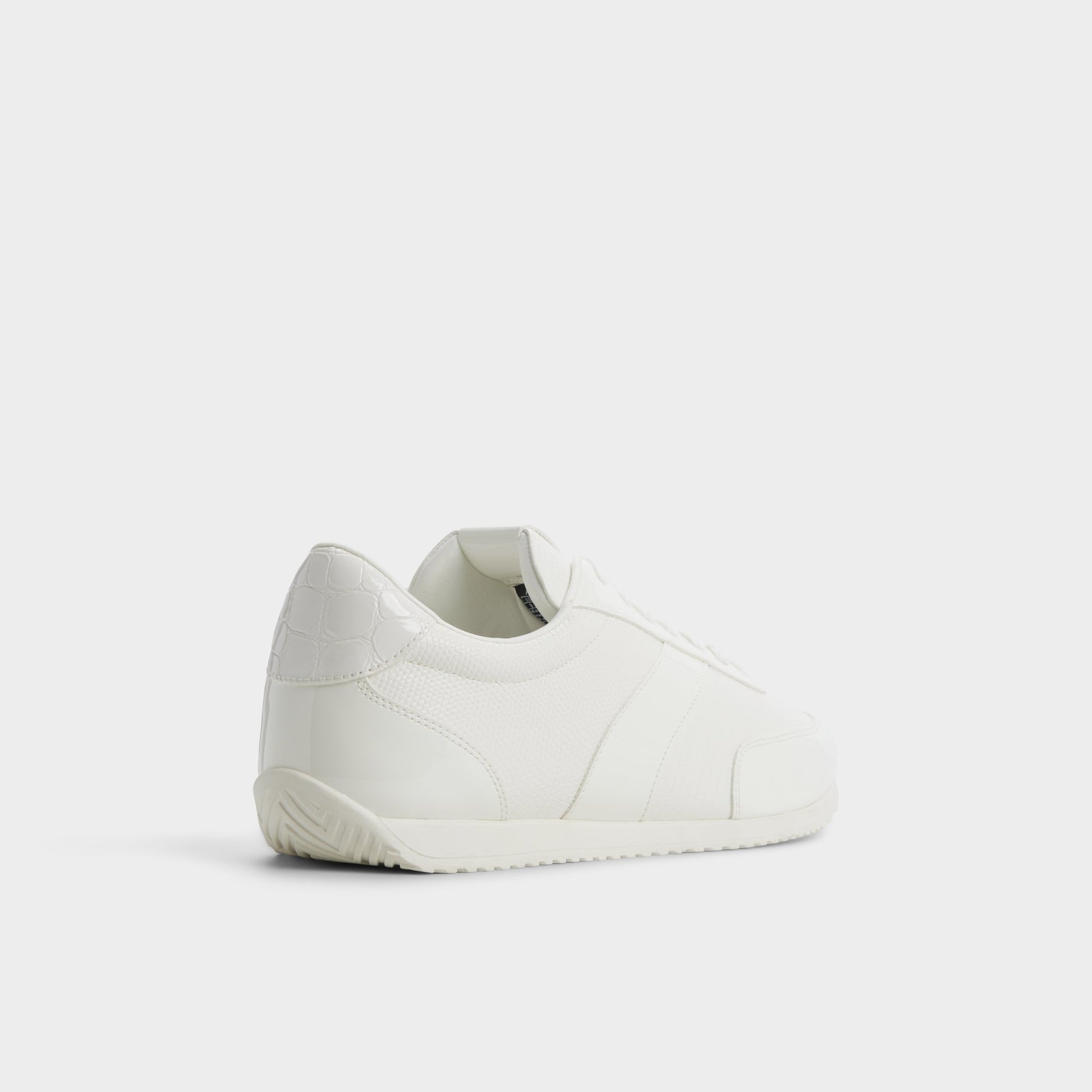 Three-quarter angle of White combo Nathaniel Low top sneaker's back side