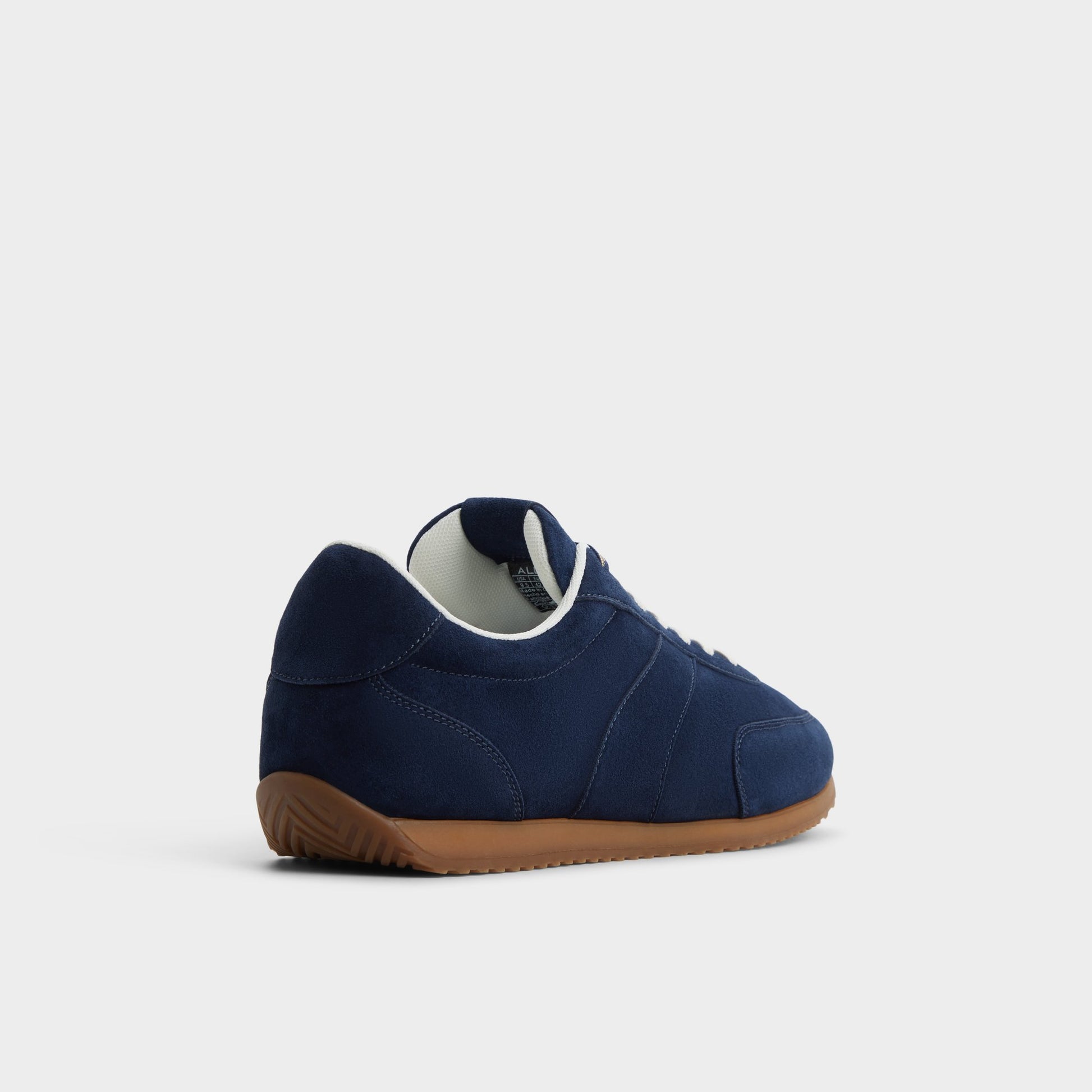 Three-quarter angle of Navy Nathaniel Low top sneaker's back side