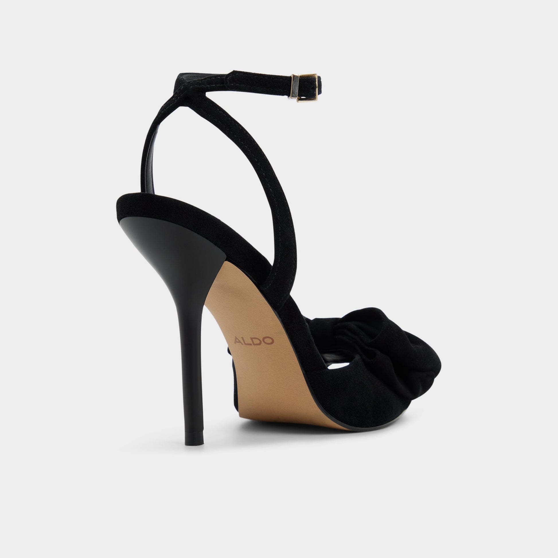 Three-quarter angle of Other Black Tinsletta Strappy heeled sandal's back side