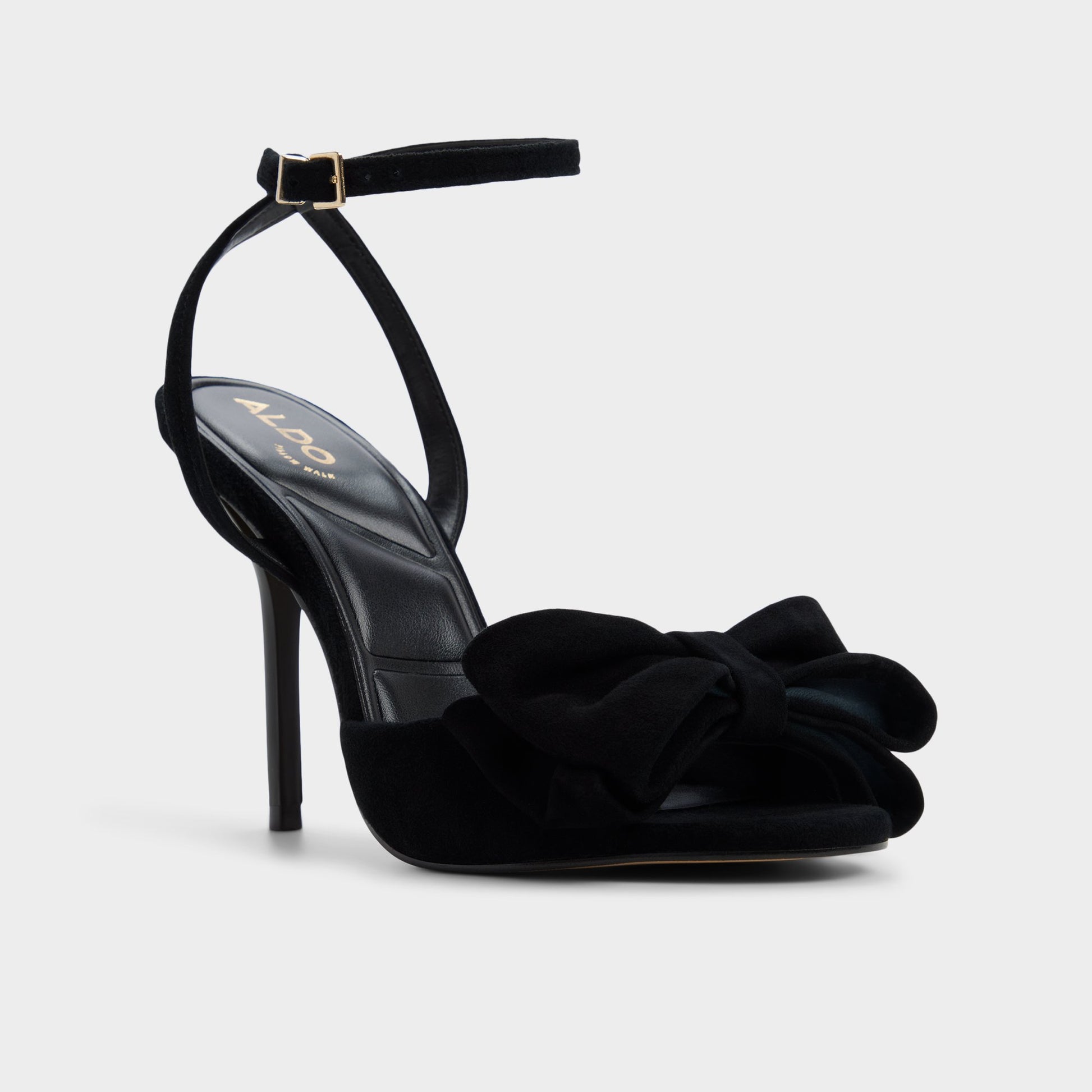 Three-quarter angle of Other Black Tinsletta Strappy heeled sandal's front side