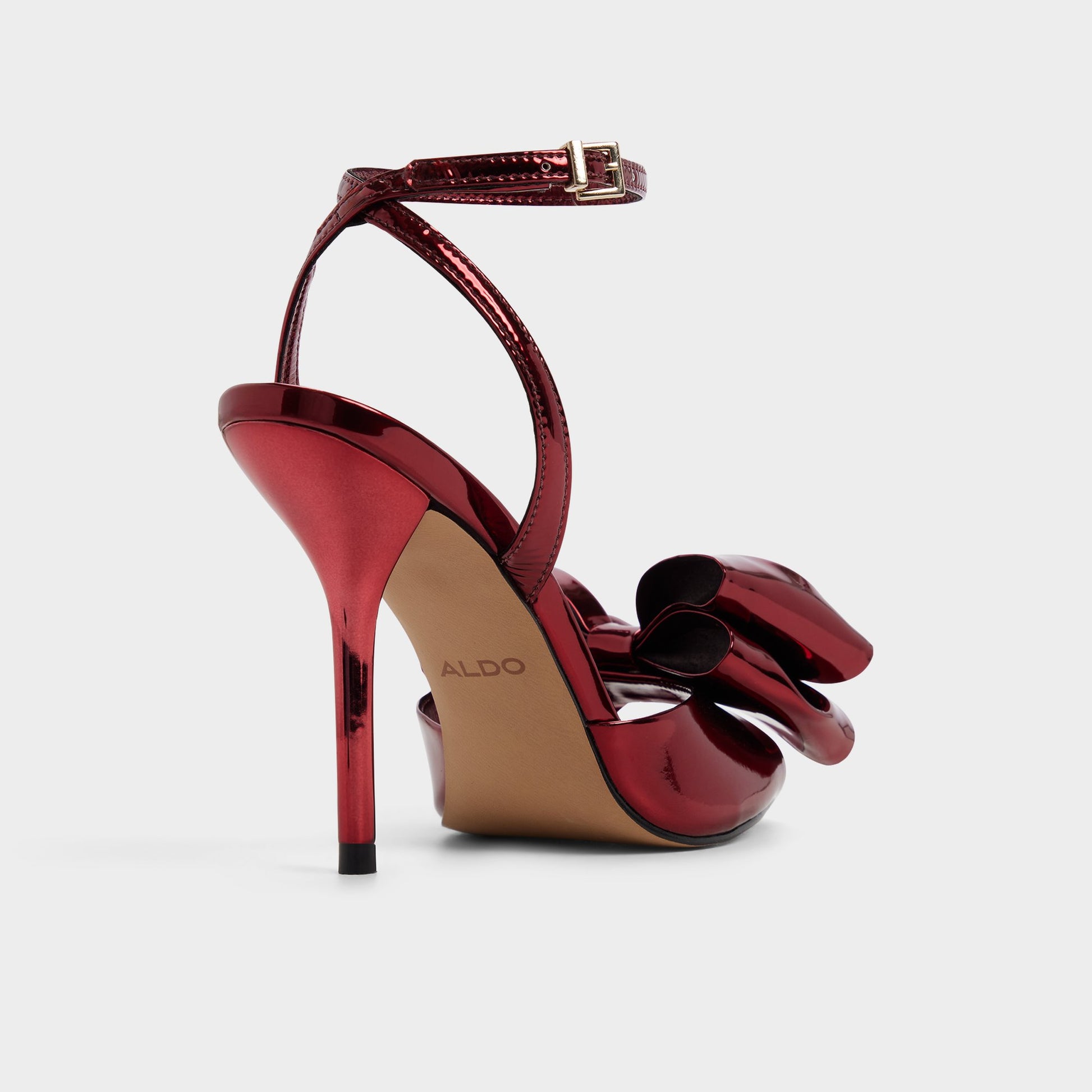 Three-quarter angle of Medium Red Tinsletta Heeled sandal's back side