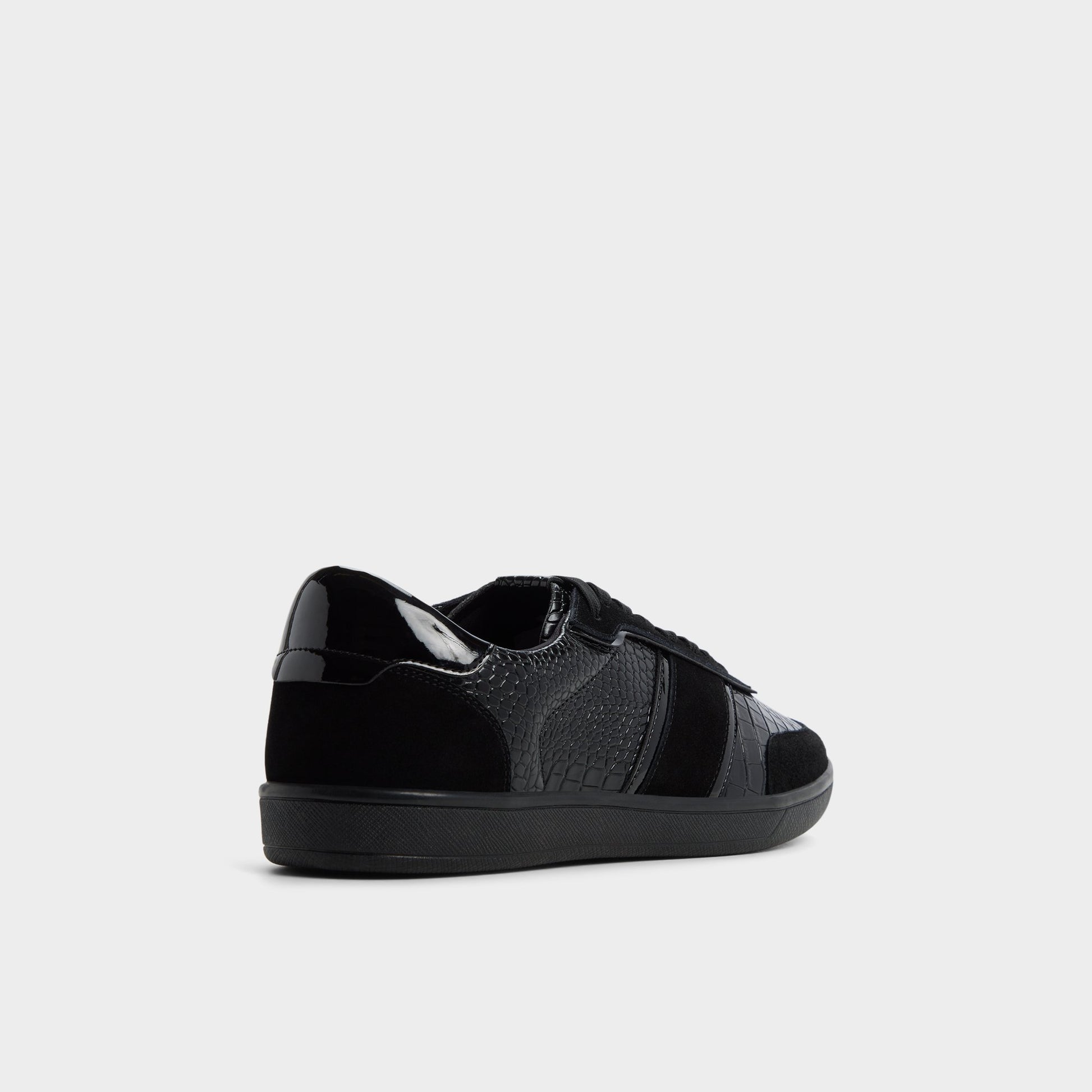 Three-quarter angle of Black Combo Uptown Low top sneaker's back side